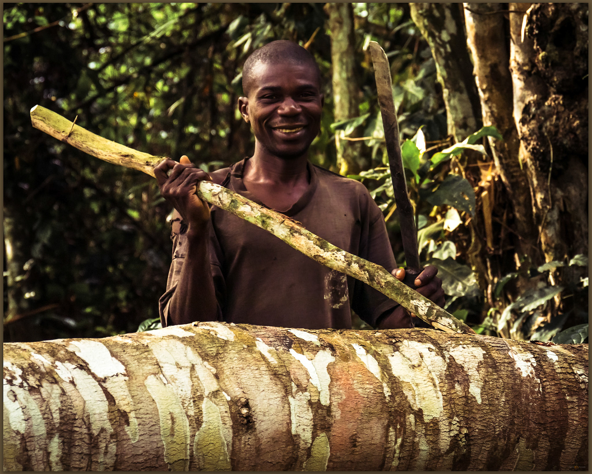 Our field assistant, Armand, creates our toolkit for the day, Moluku Region, Central African Republic
