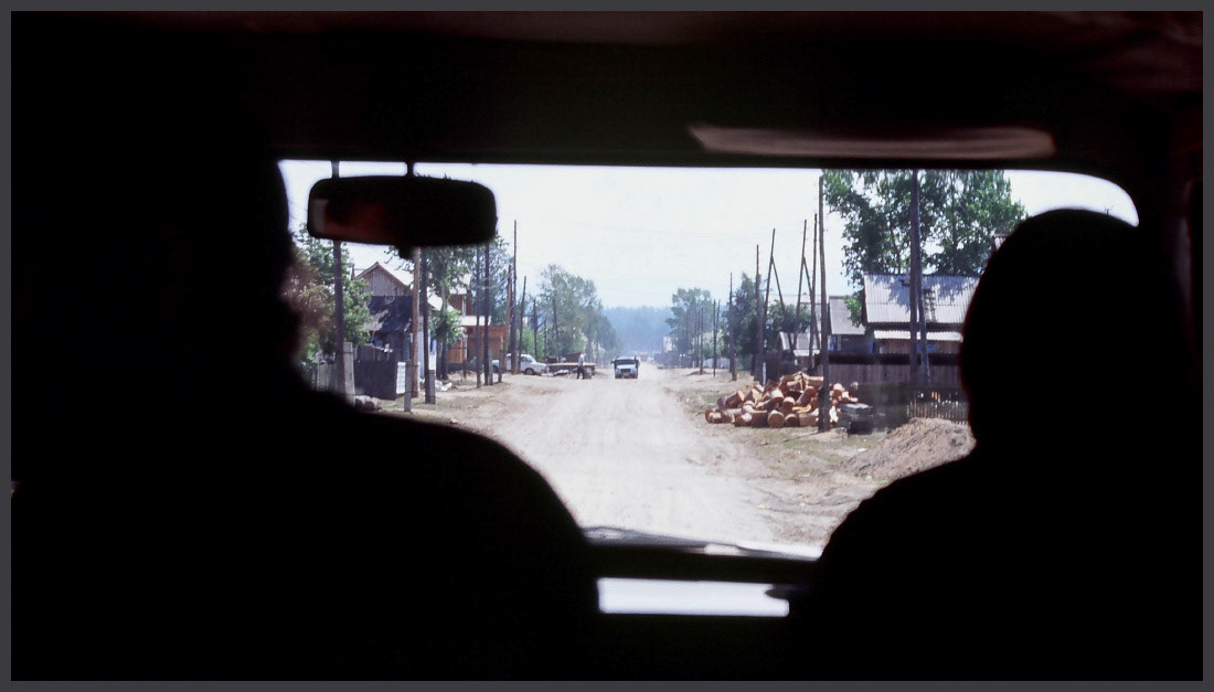 Village streets. The road to the river crossing in Ust-Barguzin, Buryatia, Russia