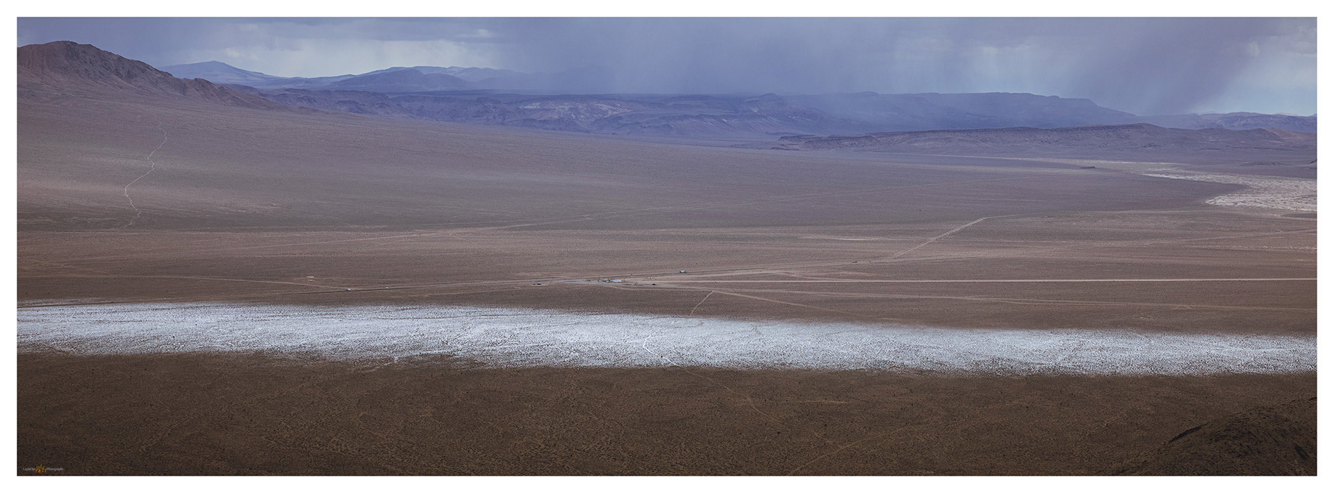 A track of snow marks the storm I left as I began the short climb of the Cuprite Hills.