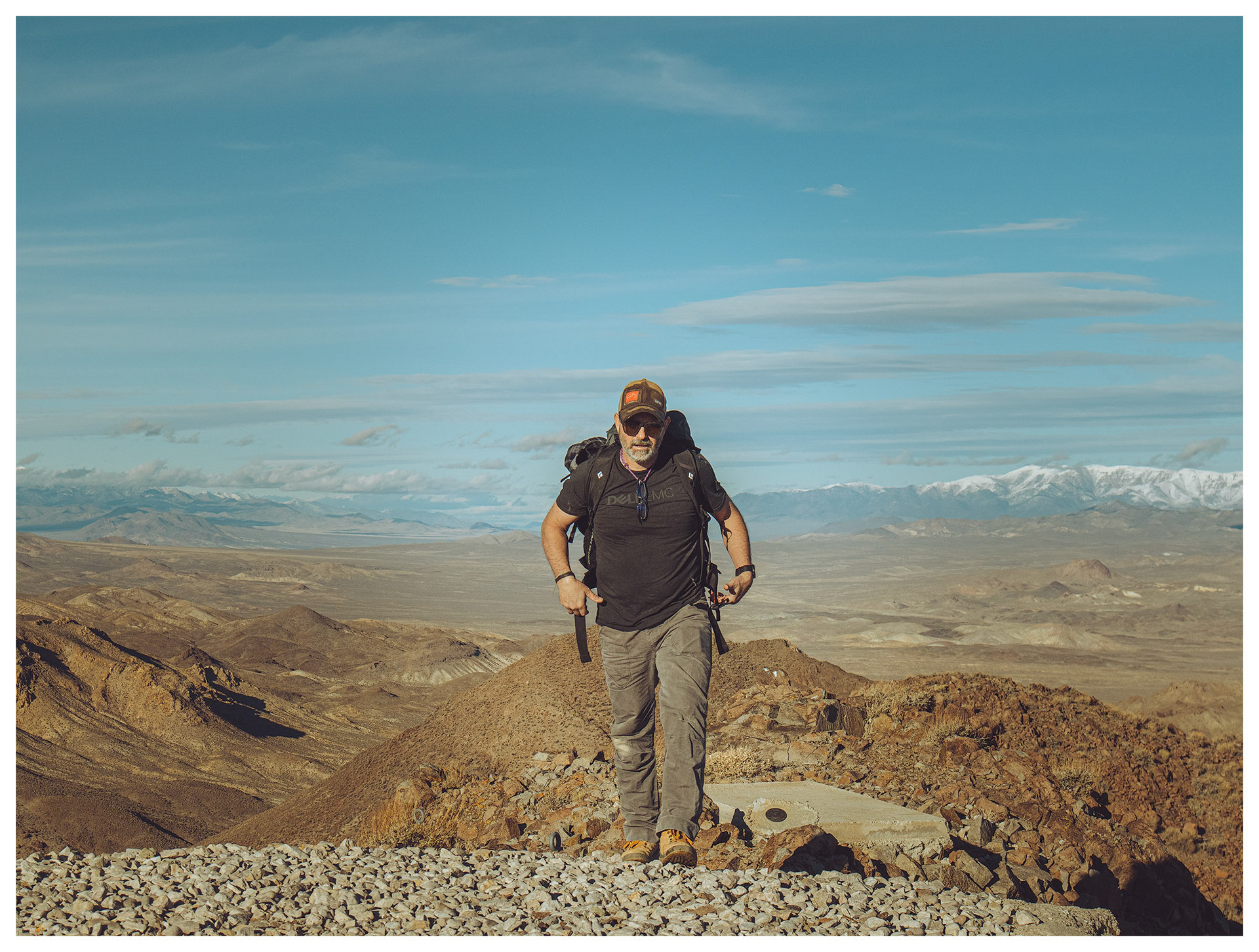 Darren arrives on the gravel pad at the summit.