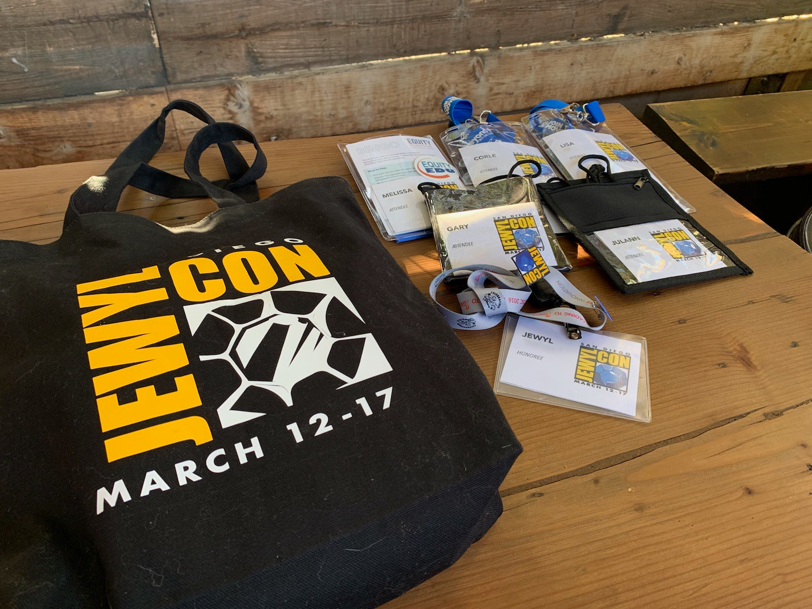 Name badges, pins, bags and tshirts