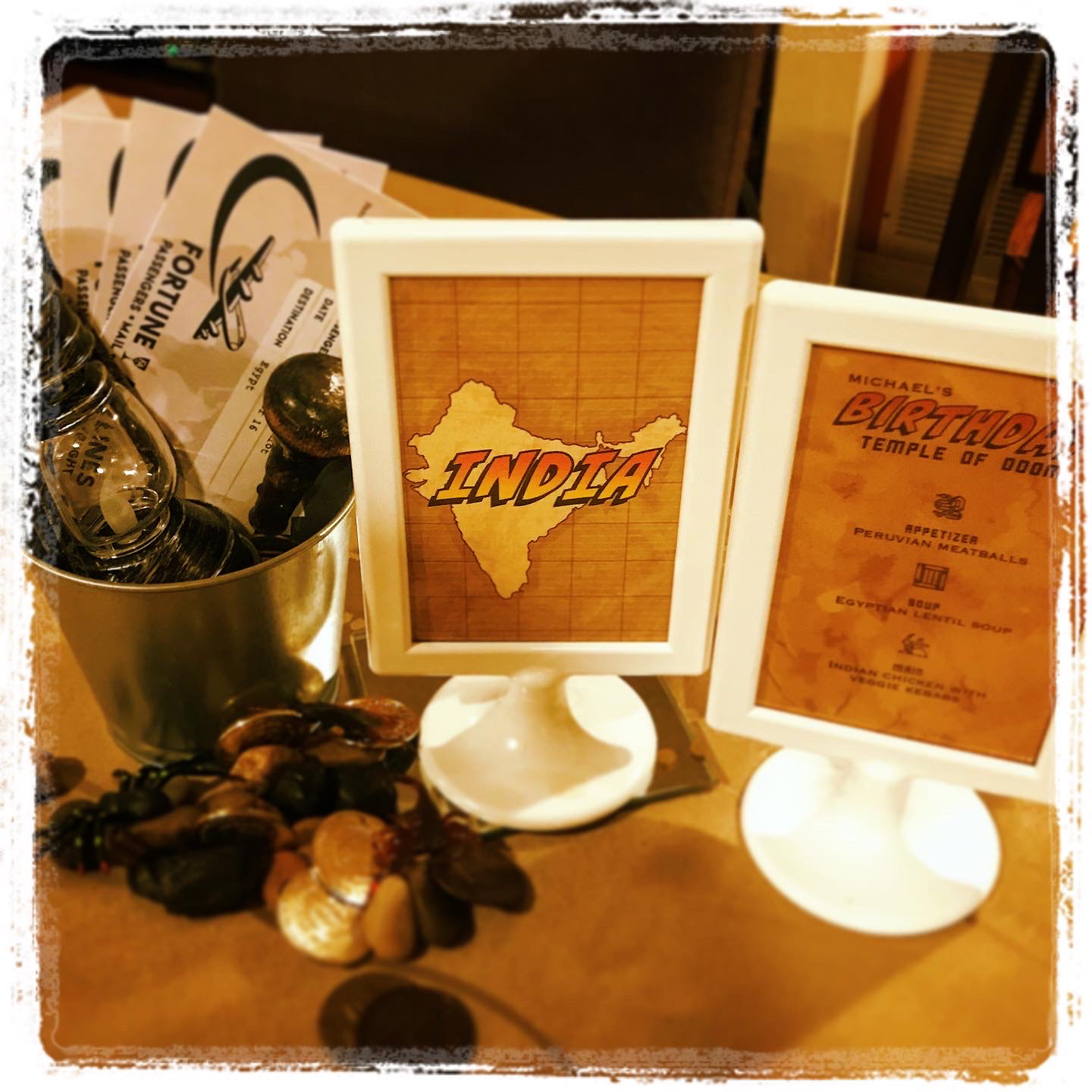 Location, menu, and puzzles make up each table centerpiece.
