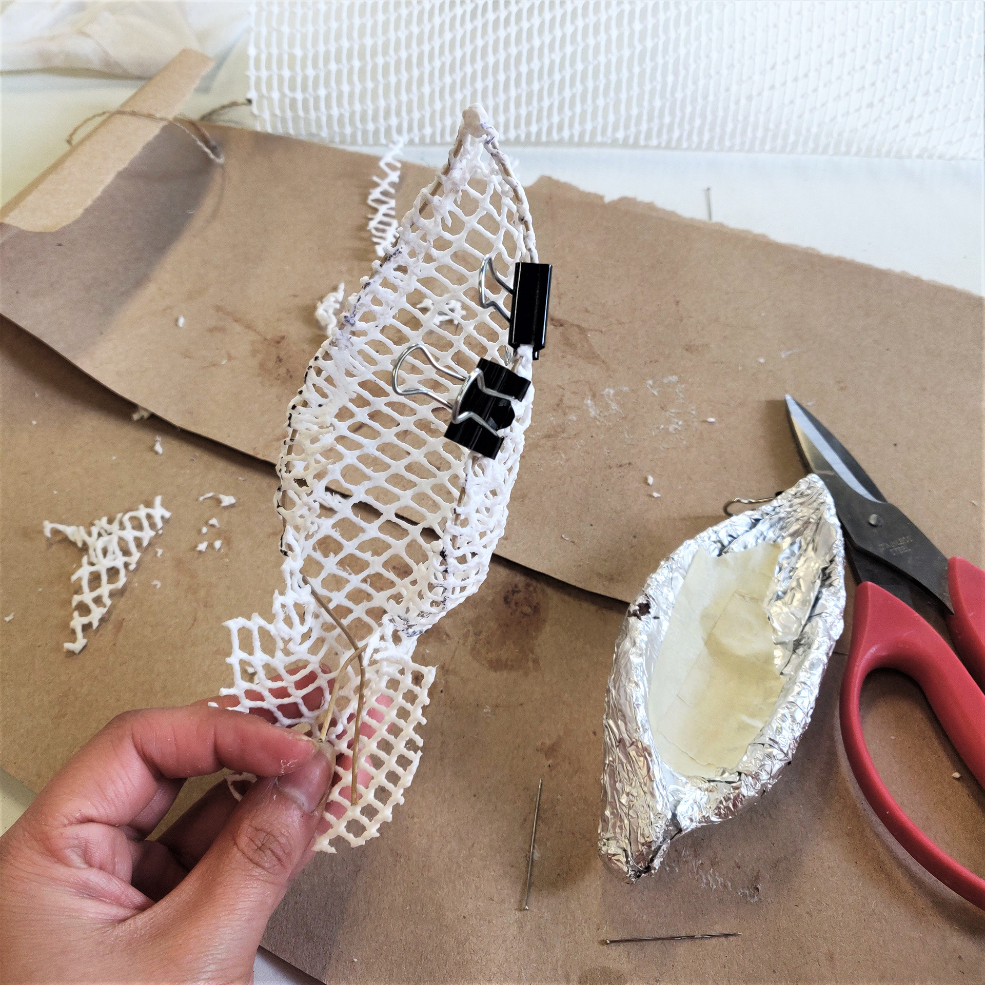 Used Clay to form shapes and draped in Varaform Mesh. Edges wired for stability.