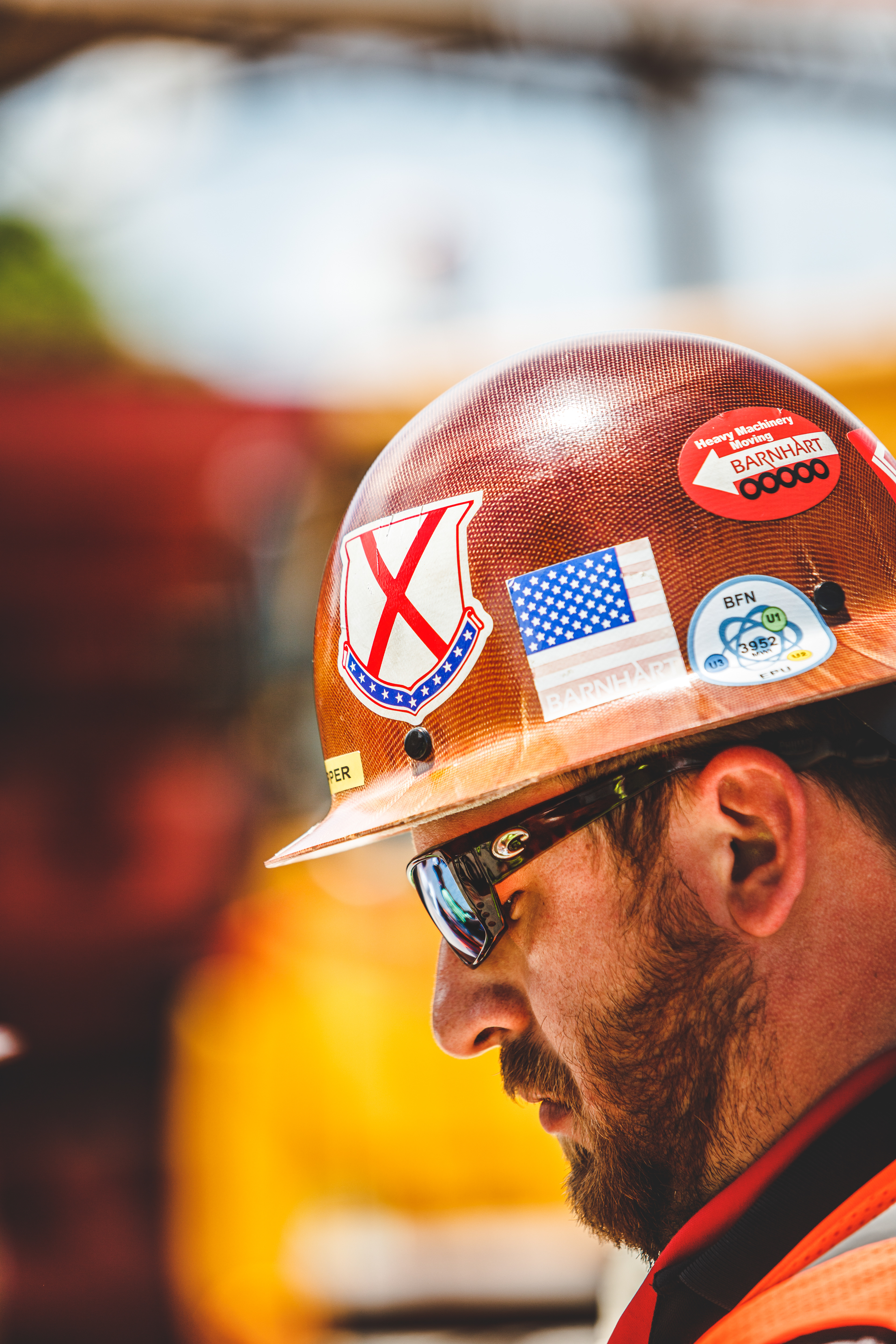 Barnhart worker in a hardhat and sunglasses