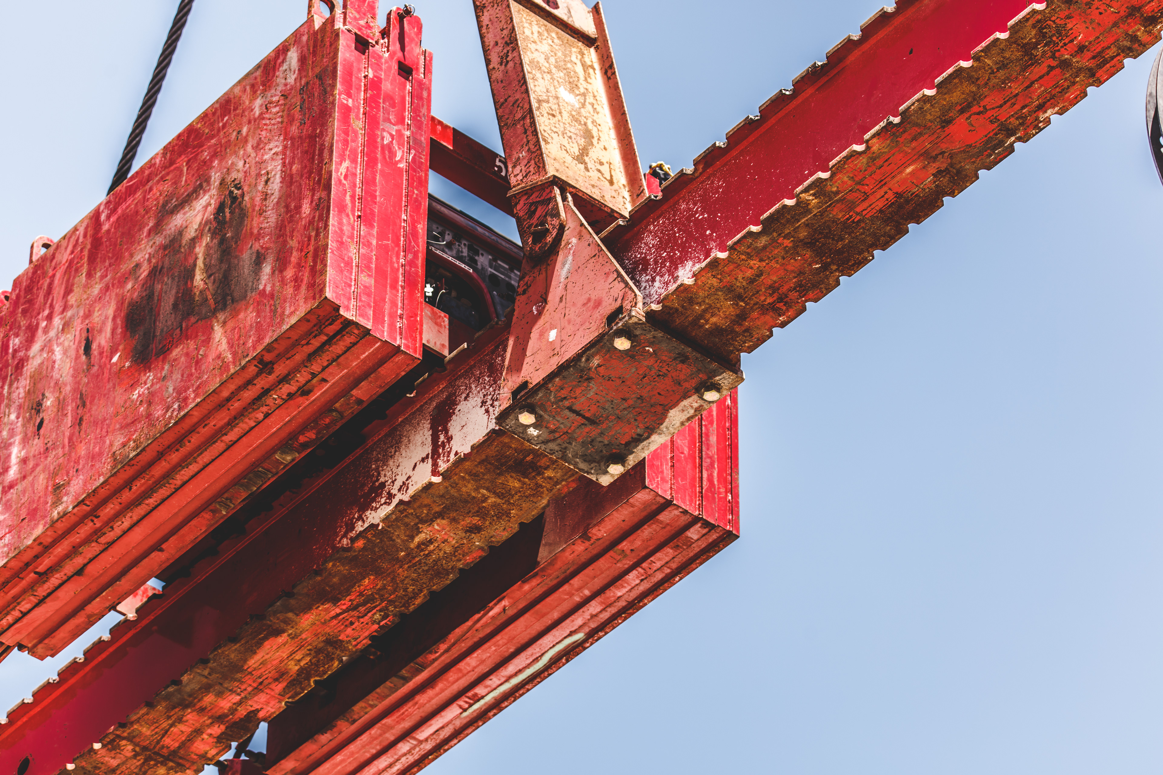 A crane holding construction materials