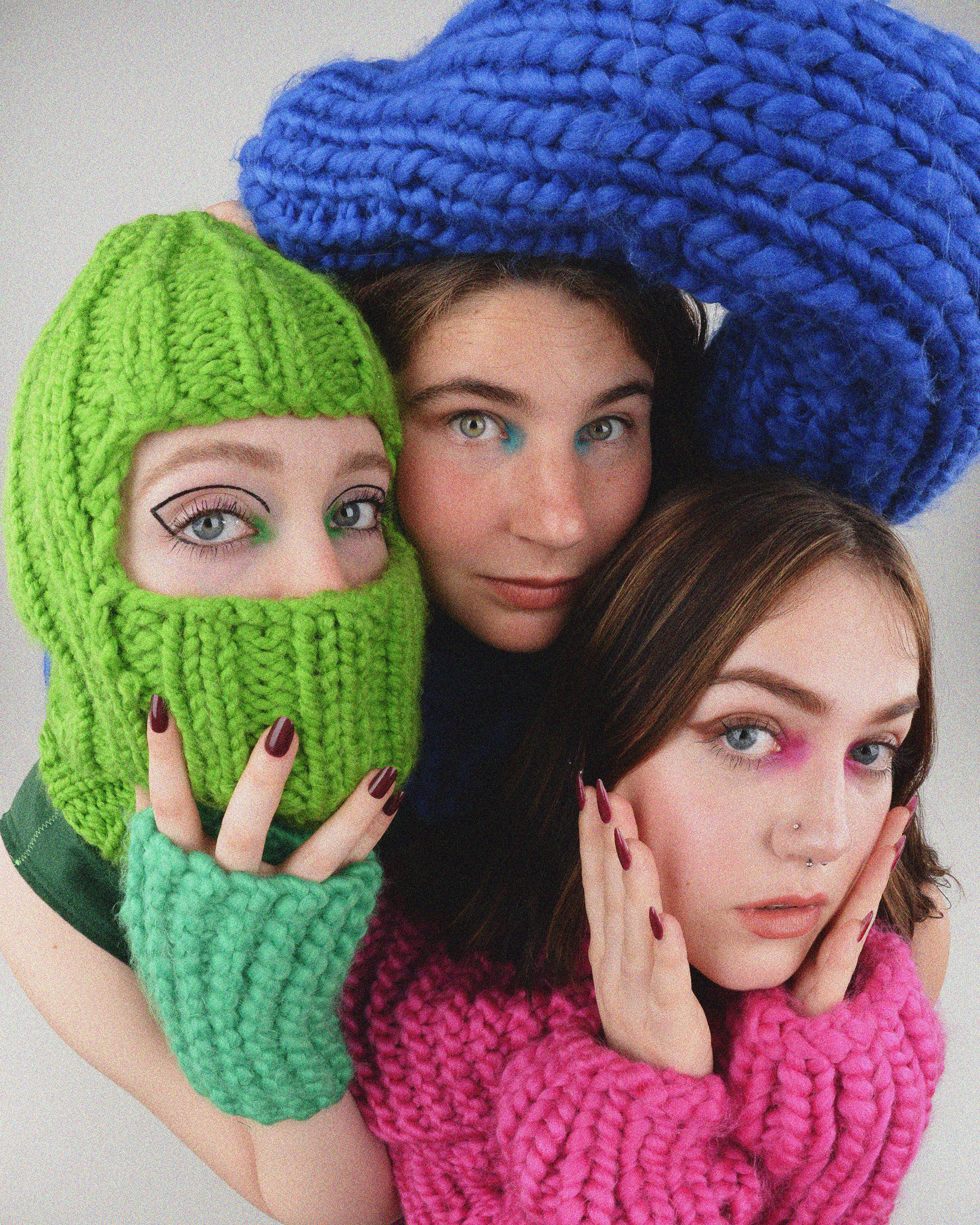Inspired by childhood memories playing in the snow. Concepts of adolescence and winter, are used create a fun and warm aestetic. There are some items of clothing that seem off-limits to adults but acceptable for children, examples are: leg warmers, hand or arm warmers, and balaclavas. Megan Freeman includes such knitted accessories in her collection to create  the sense of nostalgia and childhood joy that can too often be forgoten.