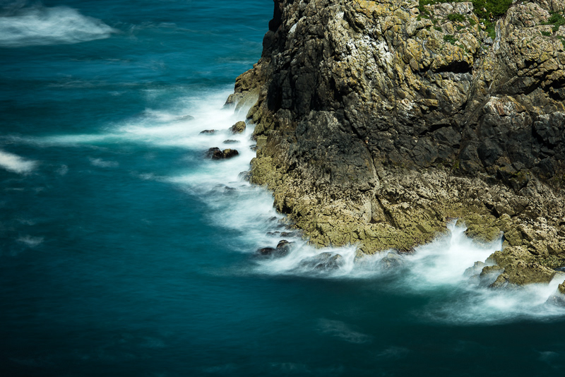 A long exposure of crashing waves against the Garland Stone off Skomer Island, Pembrokeshire, Wales.
