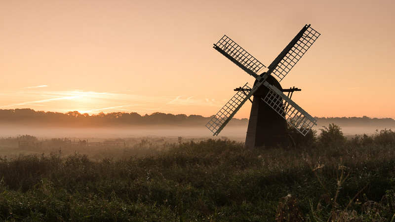 A misty sunrise at Herring Fleet wind mill, Suffolk.