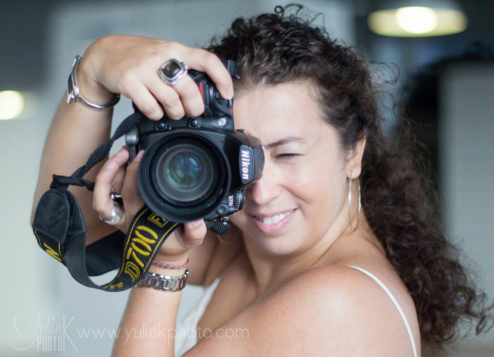 Photographer and her Nikon