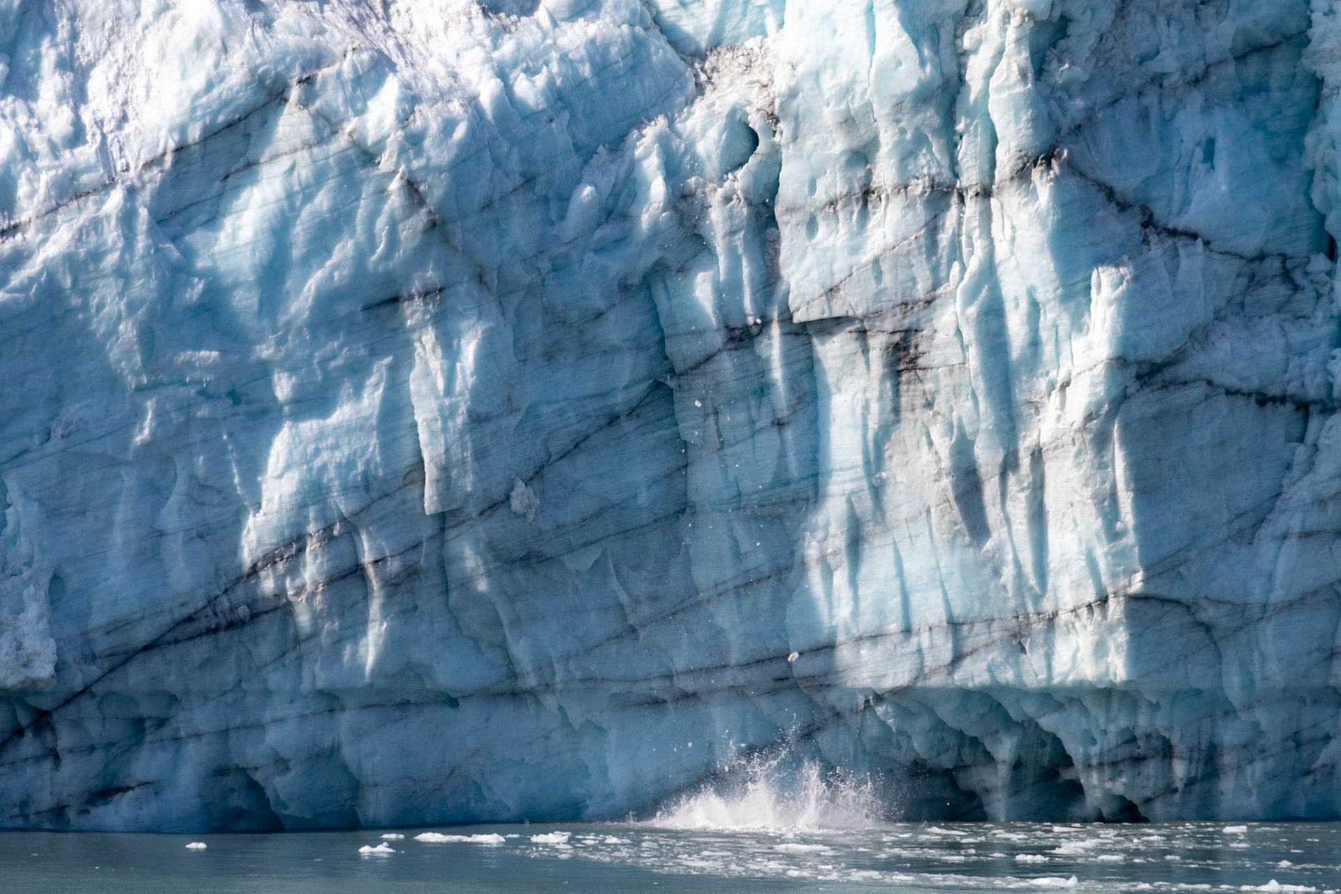 Small chunks of ice falling from the Margerie glcier. Don't think small means an ice cube, these chunks would kill you if they landed on you!