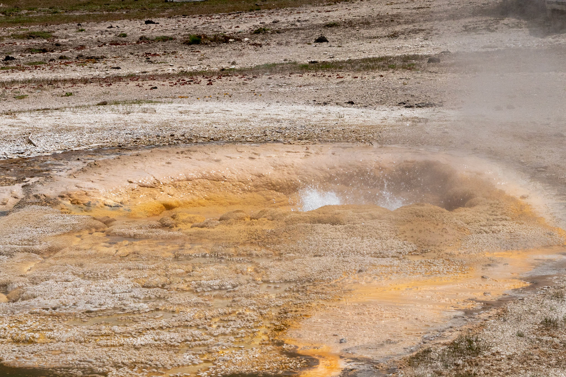 Burbling colorful geysers