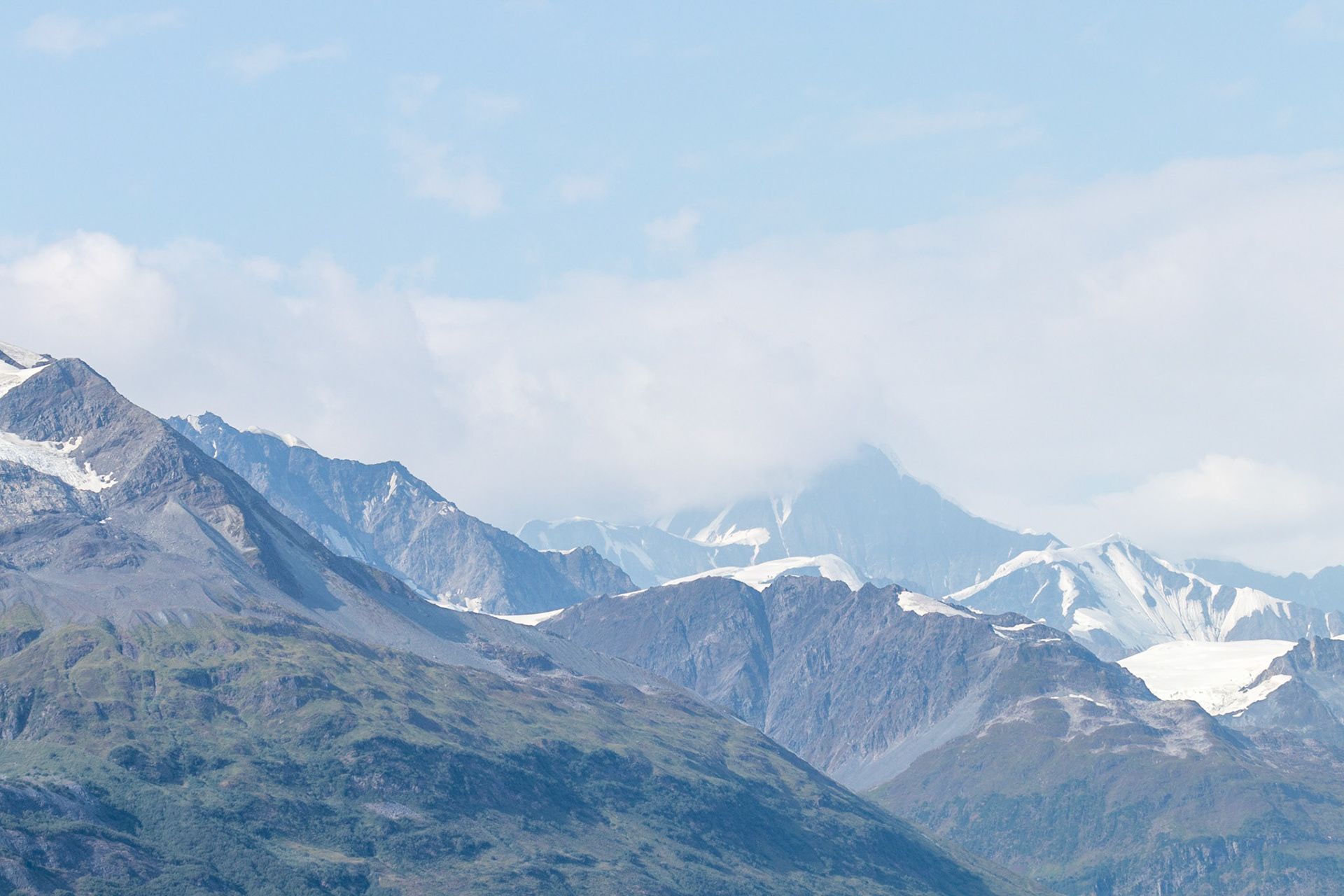 Views of various distant glaciers in College Fjord