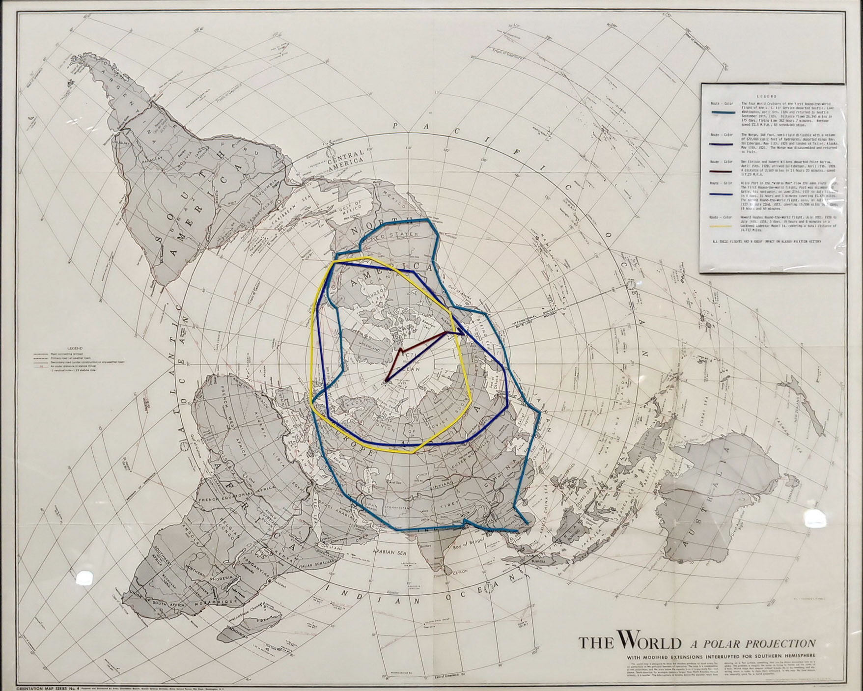 A cloth aviation map on display, showing the around the world routes taken by early fliers.