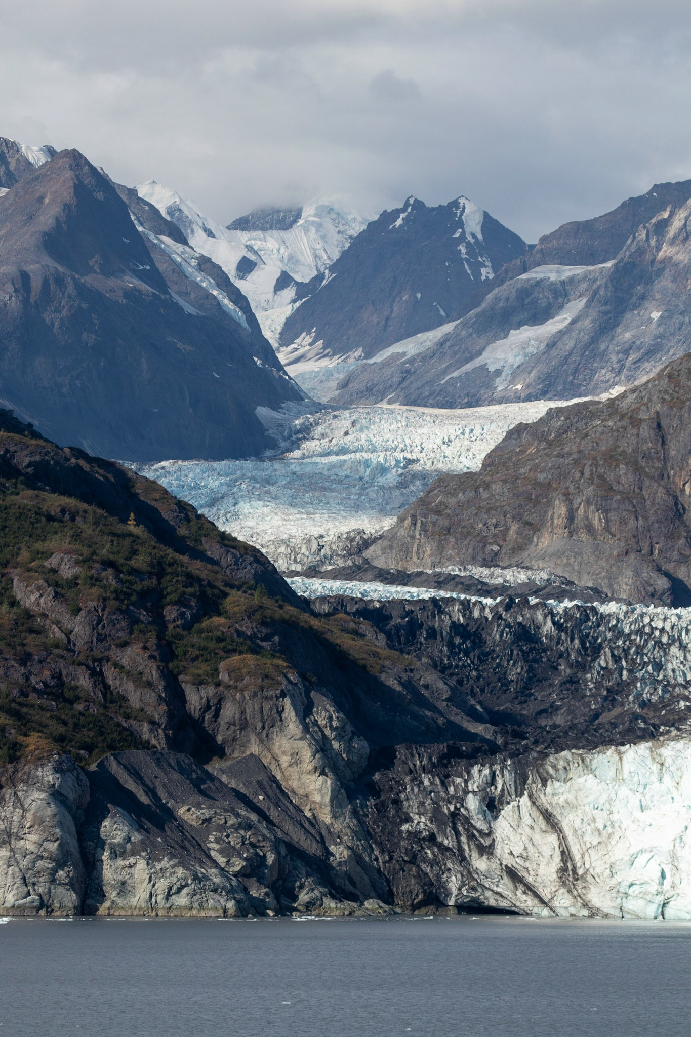 A view of the Margerie glacier as it flows out of the mountains.