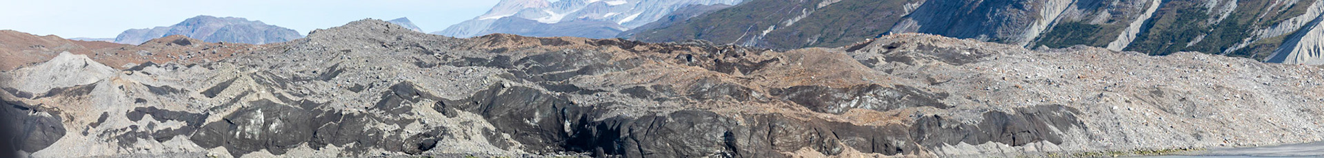 A Panorama of the face of the Grand Pacific Glacier. The face of this glacier is nearly 2 miles wide where it meets the water. The face of this glacier is in the United States, but most of the glacier actually resides within Canada.