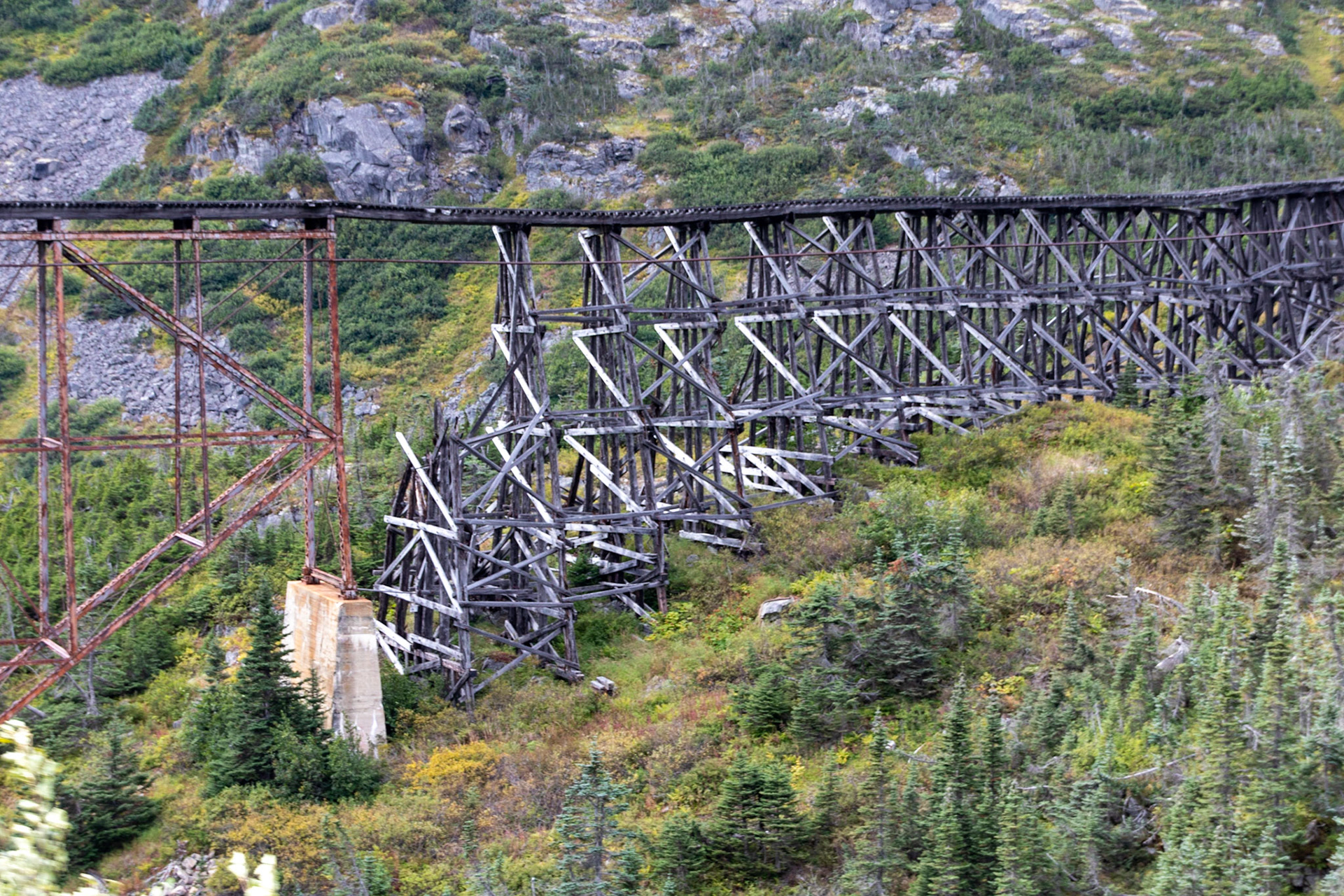 A closeup view of the dilapidated condition of the original rail bridge.