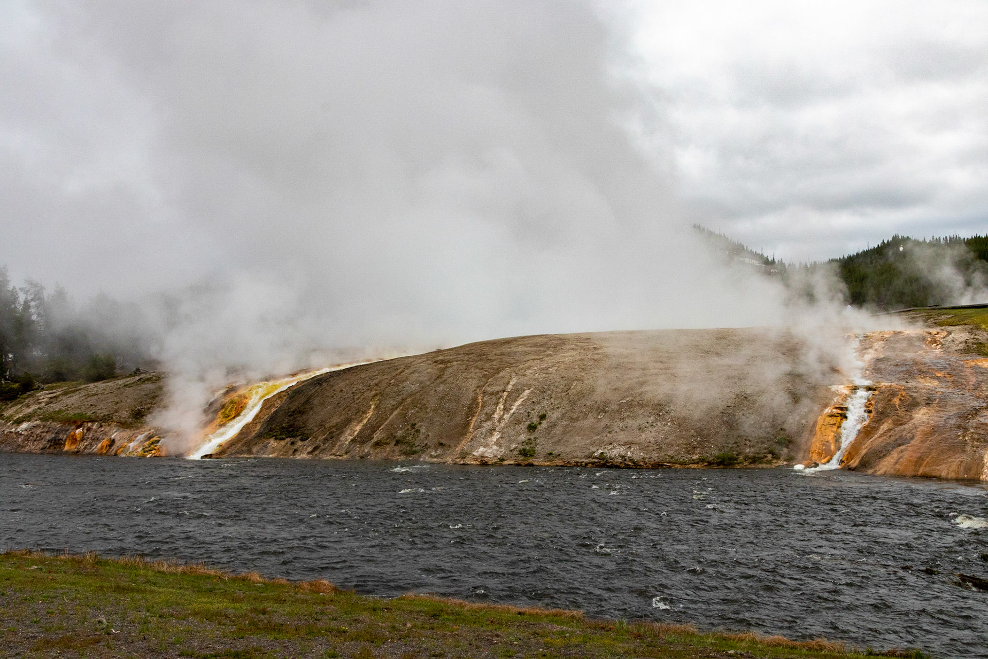 The Firehole river receives 4000 gallons of runoff from the Excelsior geyser per minute