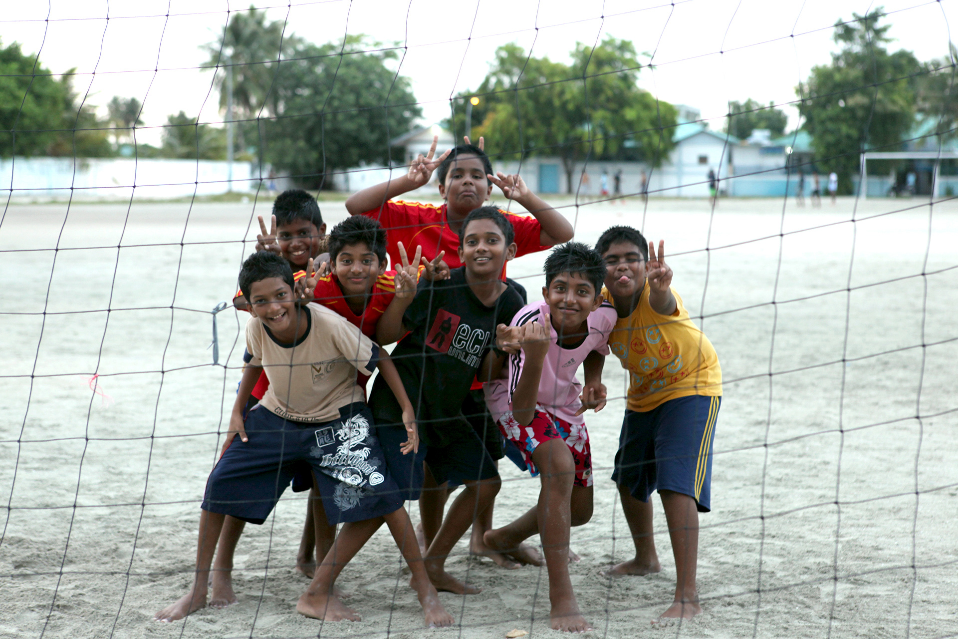 Children playing football, MALDIVES
