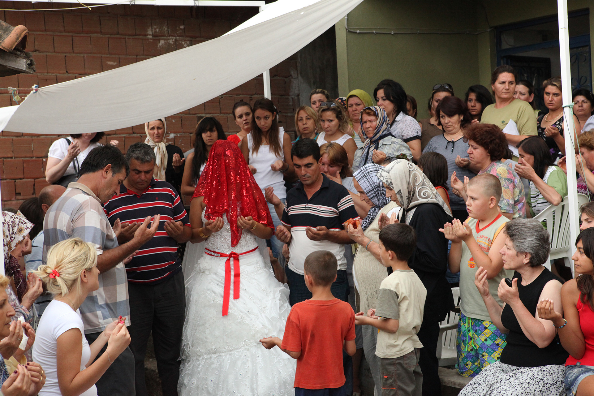 Pray at Bride's house before she leaves. Traditional wedding at TURKEY