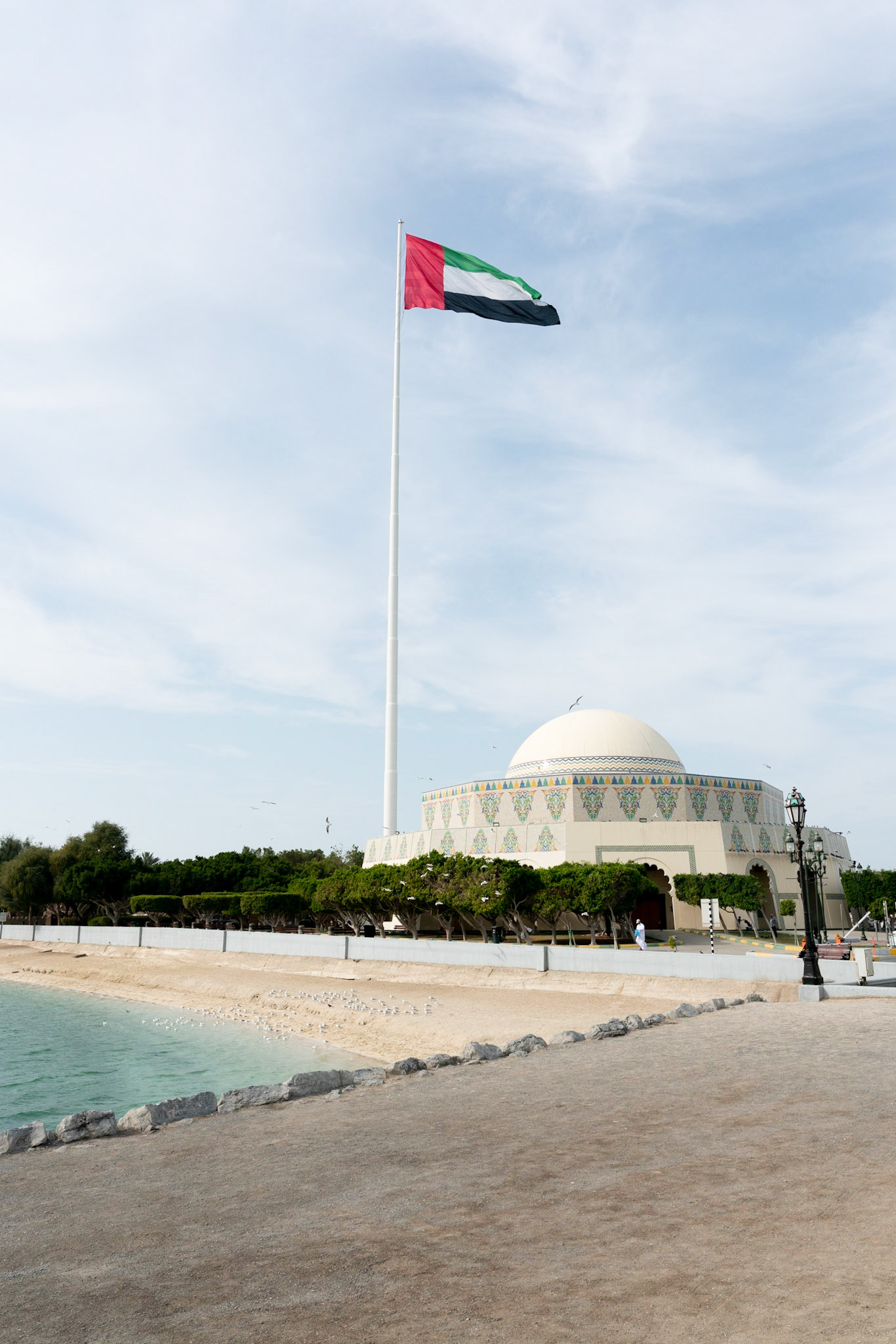 UAE Flag in Abu Dhabi (UAE) with Abu Dhabi Theater - Emirates Heritage Club