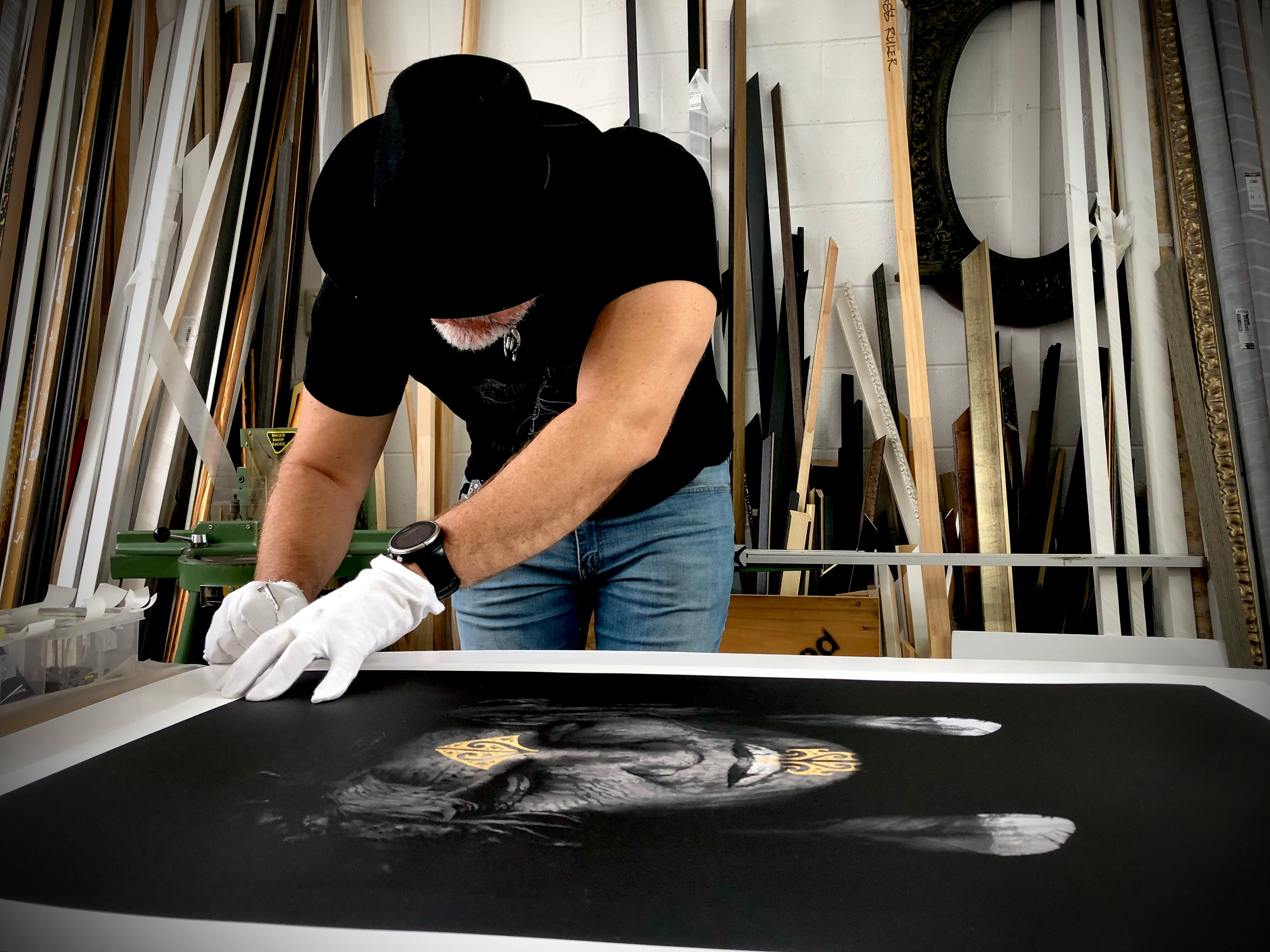 David framing one of Sophia Minson's Fine art prints.