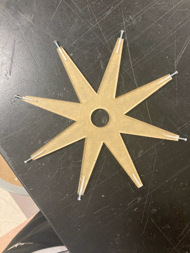 The swivel that connected the acrylic wheels to the base
