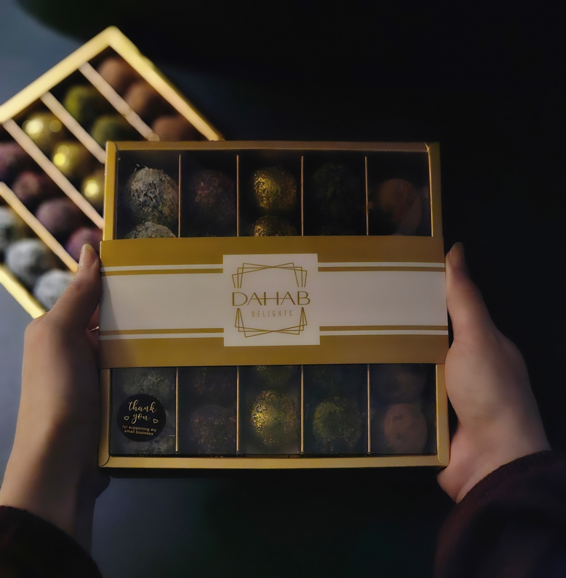 DAHAB DELIGHTS 25 DATE BITES, cocoa, coconut, pistachio, deep blossom water, and cardamom. $2.99 