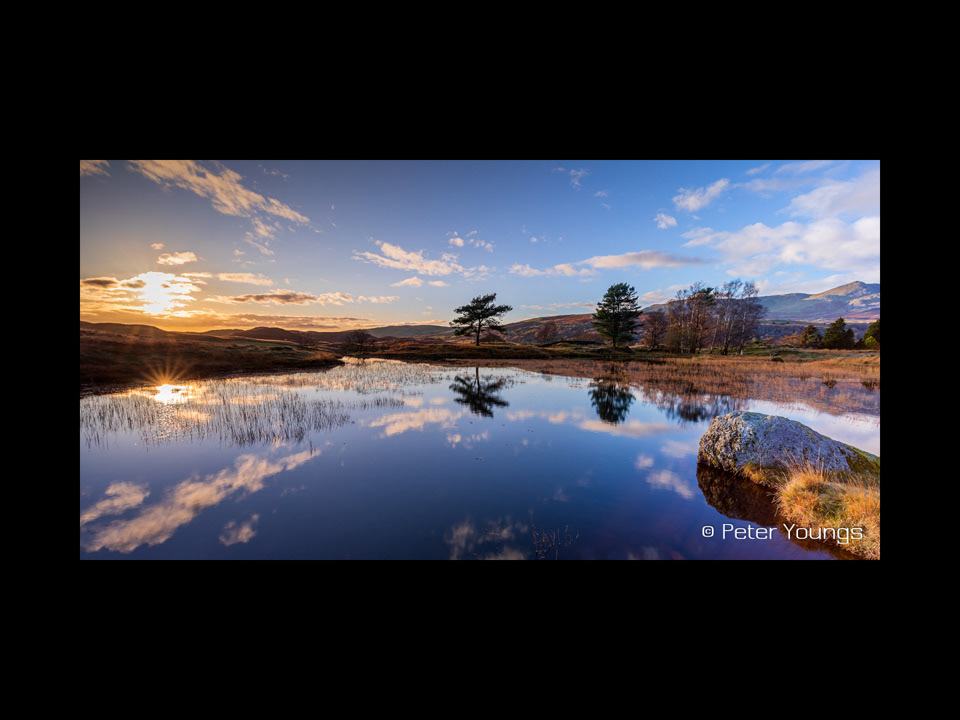 A Sunset behind Kelly Hall Tarn in the English Lake District