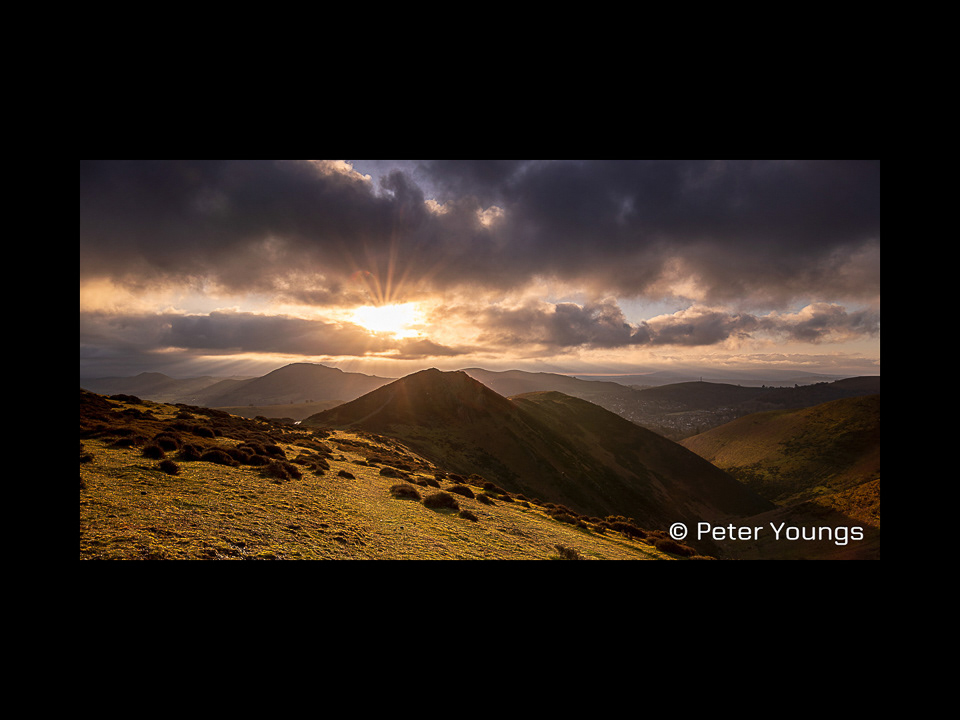 A dark and menacing sunrise above Burway Hill - Church Stretton