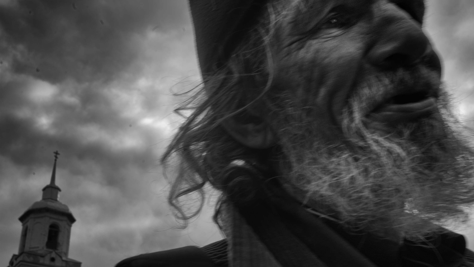 A pilgrim takes part in the religious procession