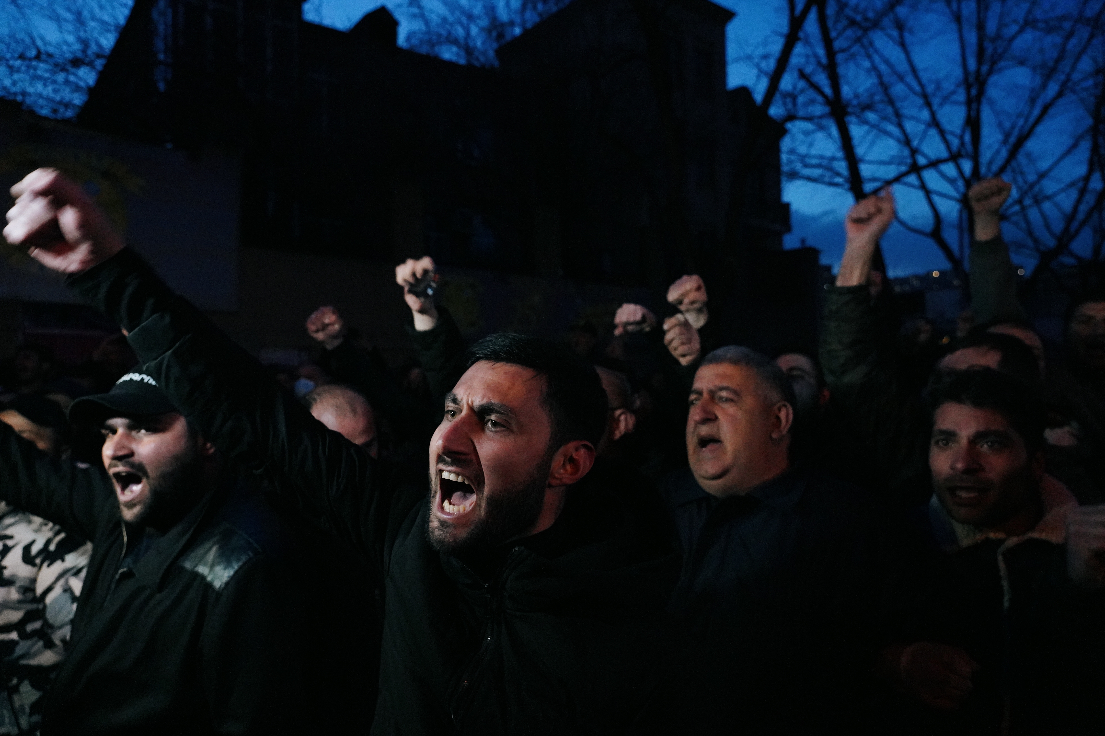 People shout slogans during an opposition rally to demand the resignation of Armenian Prime Minister Nikol Pashinyan in Yerevan, Armenia March 9, 2021. REUTERS/Artem Mikryukov