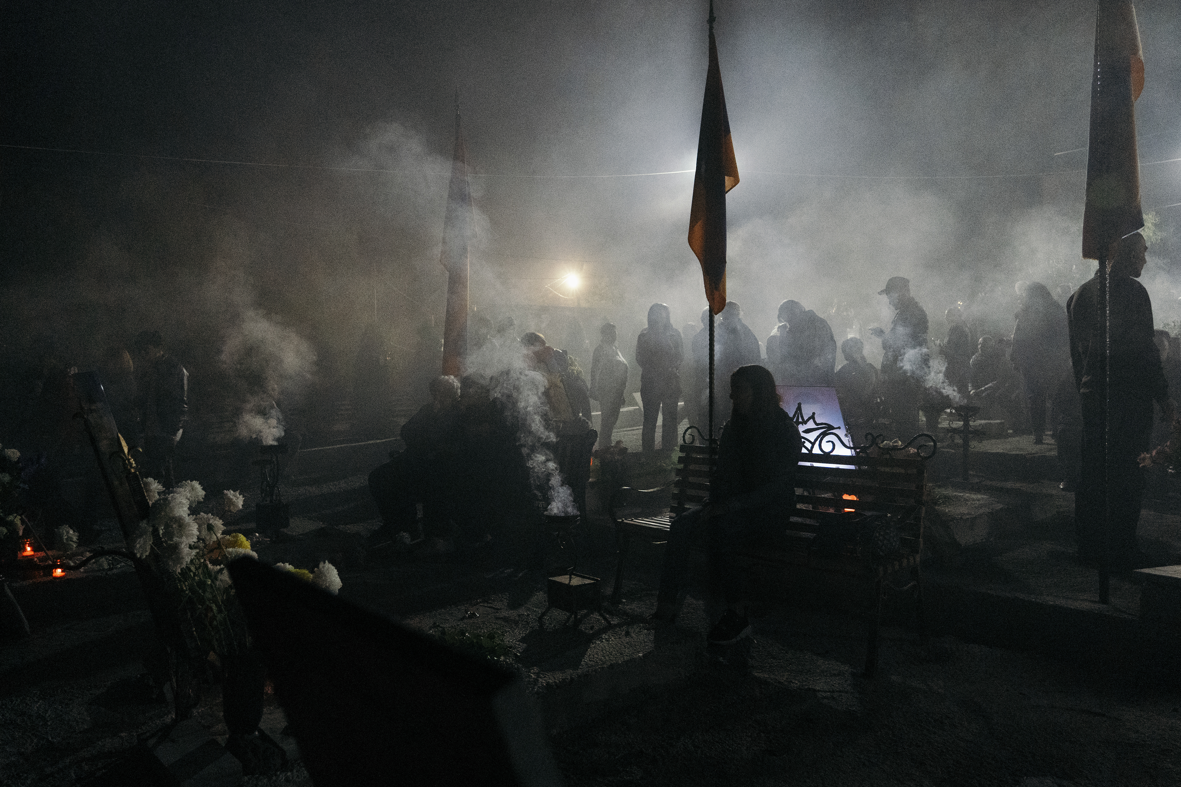 Mourners gather at Yerablur Military Pantheon military cemetery to commemorate Armenian service members killed in a conflict over the region of Nagorno-Karabakh on the eve of the first anniversary of conflict escalation in Yerevan, Armenia September 26, 2021. REUTERS/Artem Mikryukov