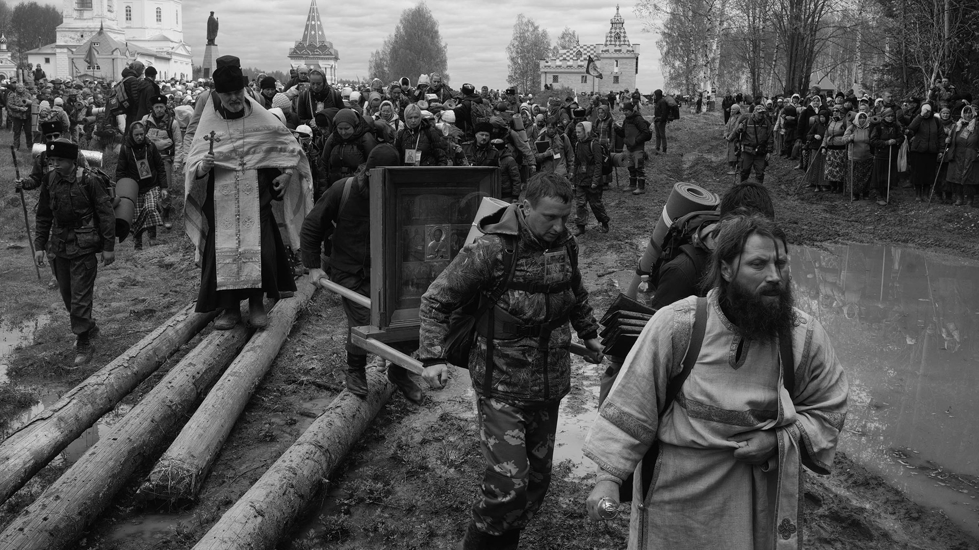 Orthodox clergymen carry an icon of St Nicholas during the Velikoretsky religious procession