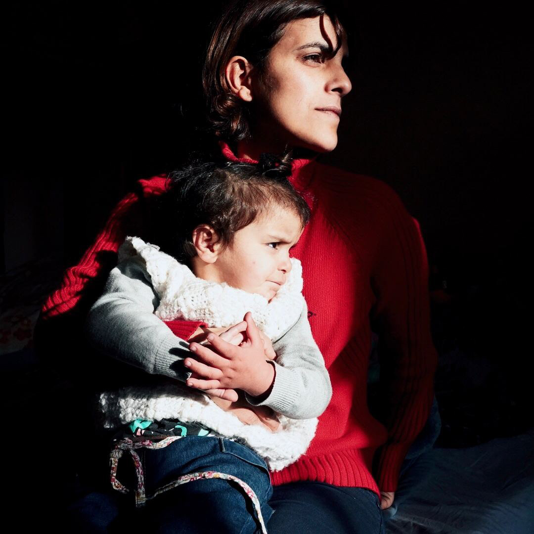 A refugee from Nagorno-Karabakh with her child. 2020