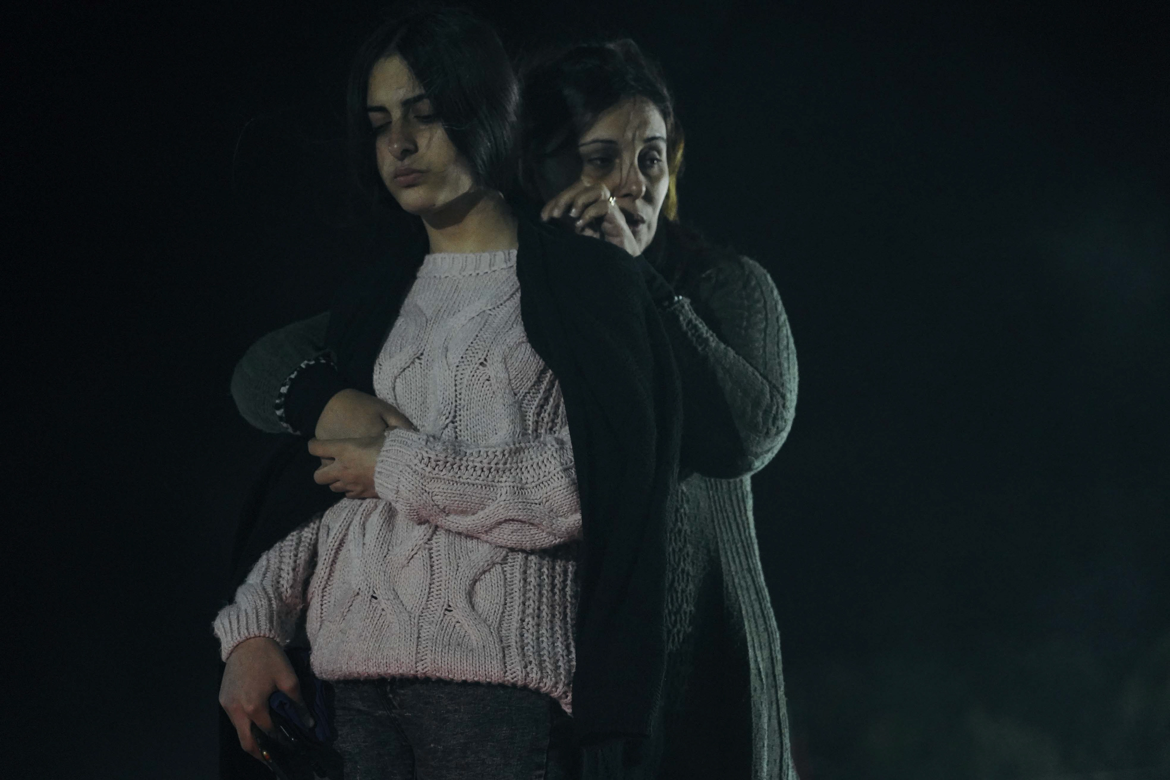 Mourners gather at Yerablur Military Pantheon military cemetery to commemorate Armenian service members killed in a conflict over the region of Nagorno-Karabakh on the eve of the first anniversary of conflict escalation in Yerevan, Armenia September 26, 2021. REUTERS/Artem Mikryukov