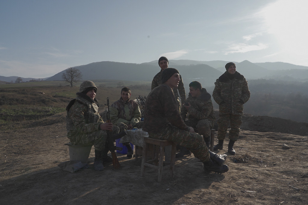 Ethnic Armenian soldiers gather at their fighting positions near the village of Taghavard in the region of Nagorno-Karabakh, January 11, 2021. REUTERS/Artem Mikryukov
