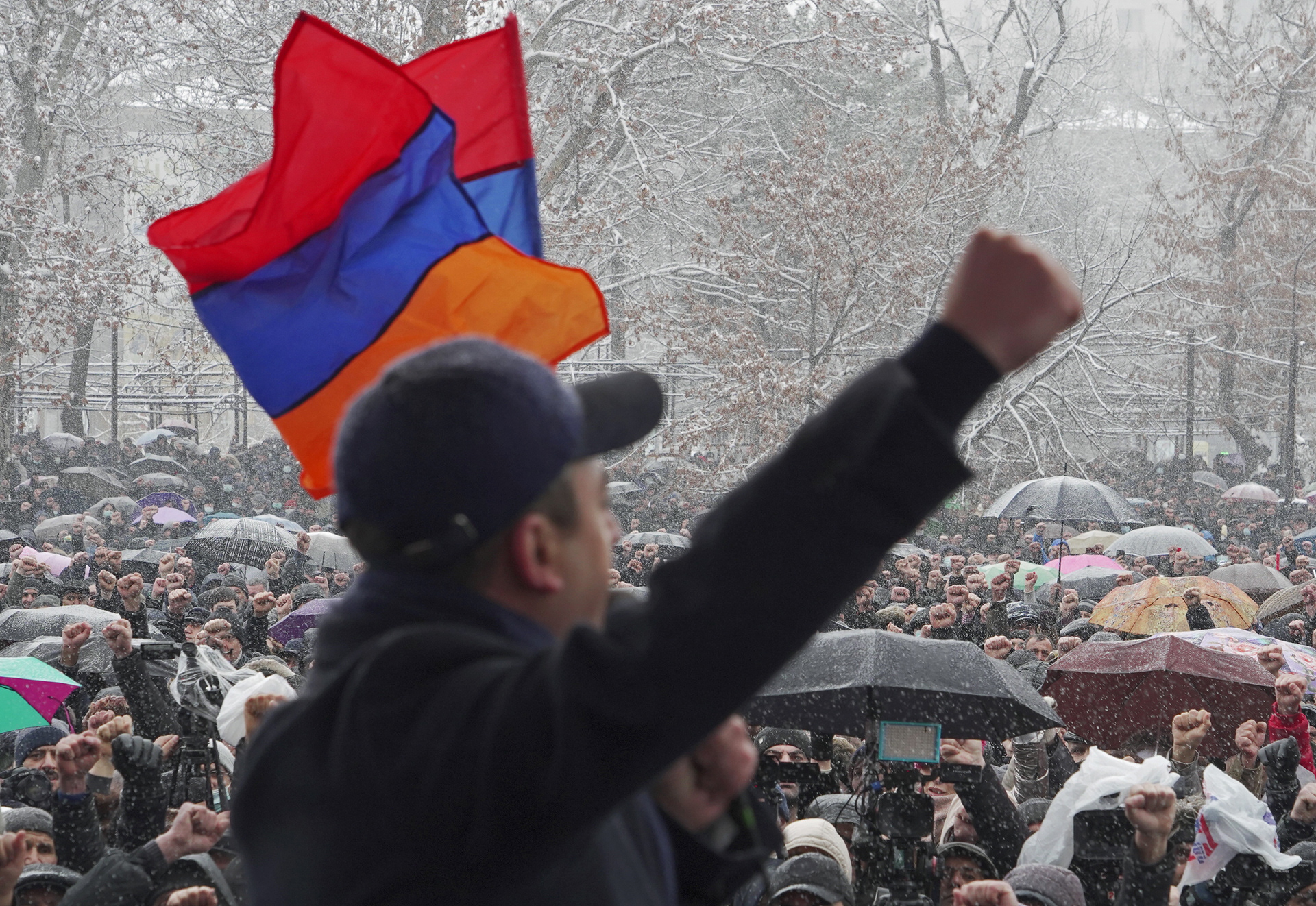 People attend an opposition rally to demand the resignation of Prime Minister Nikol Pashinyan in Yerevan, Armenia February 20, 2021. REUTERS/Artem Mikryukov