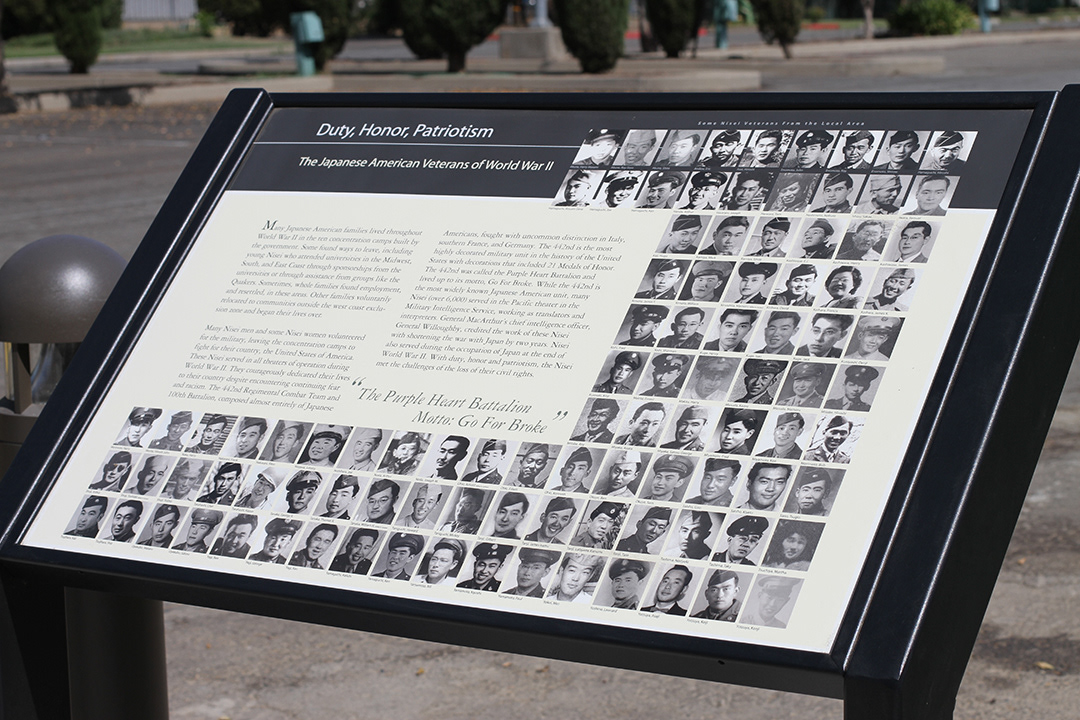 While Japanese American families were held in concentration camps, their family members fought in the US military during WWII.