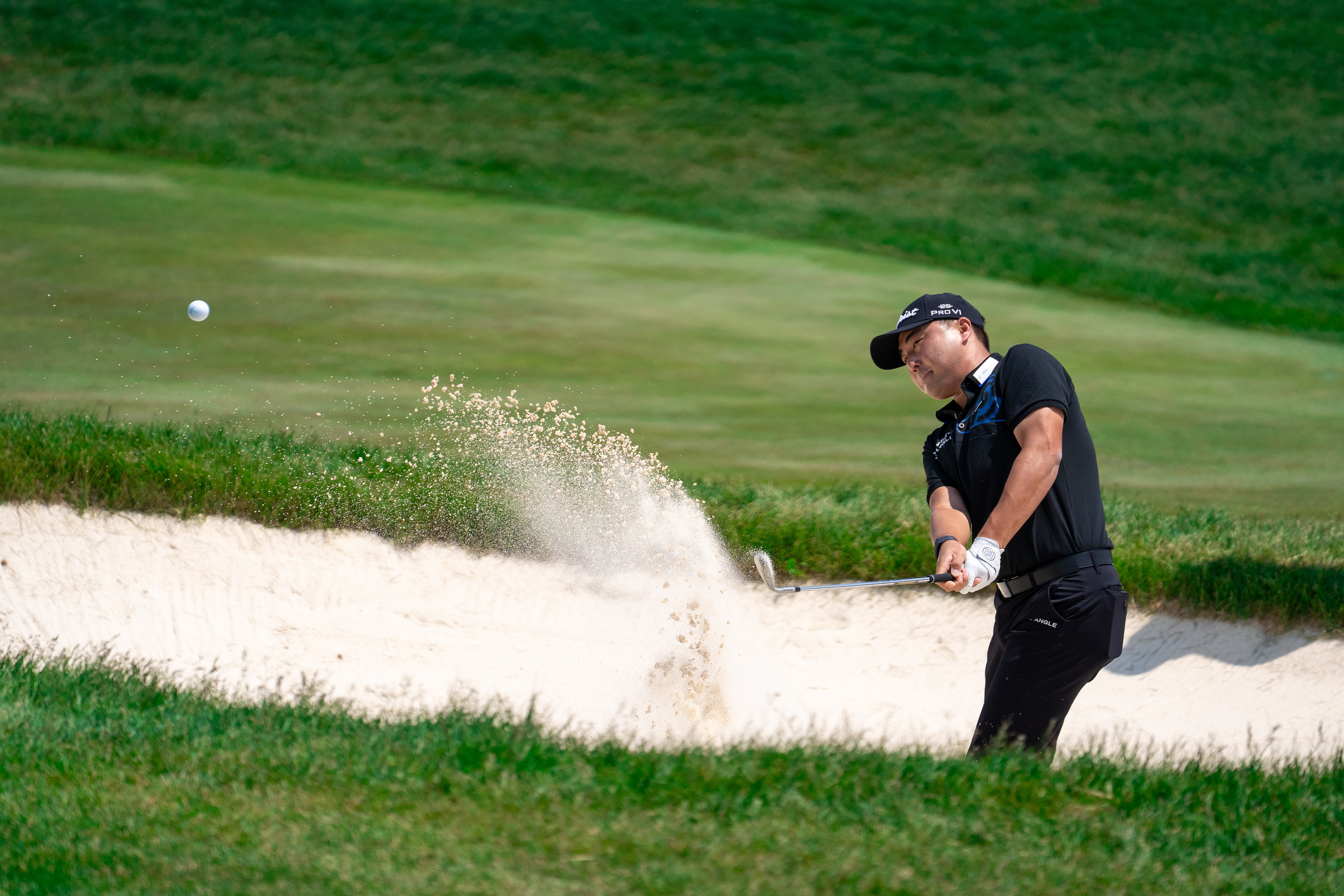Richard T. Lee of Canada plays a shot from a bunker during the second round of the RBC Canadian Open at TPC Toronto at Osprey Valley on June 6, 2025 in Caledon, Ontario, Canada. (Photo by Jay Barlett)