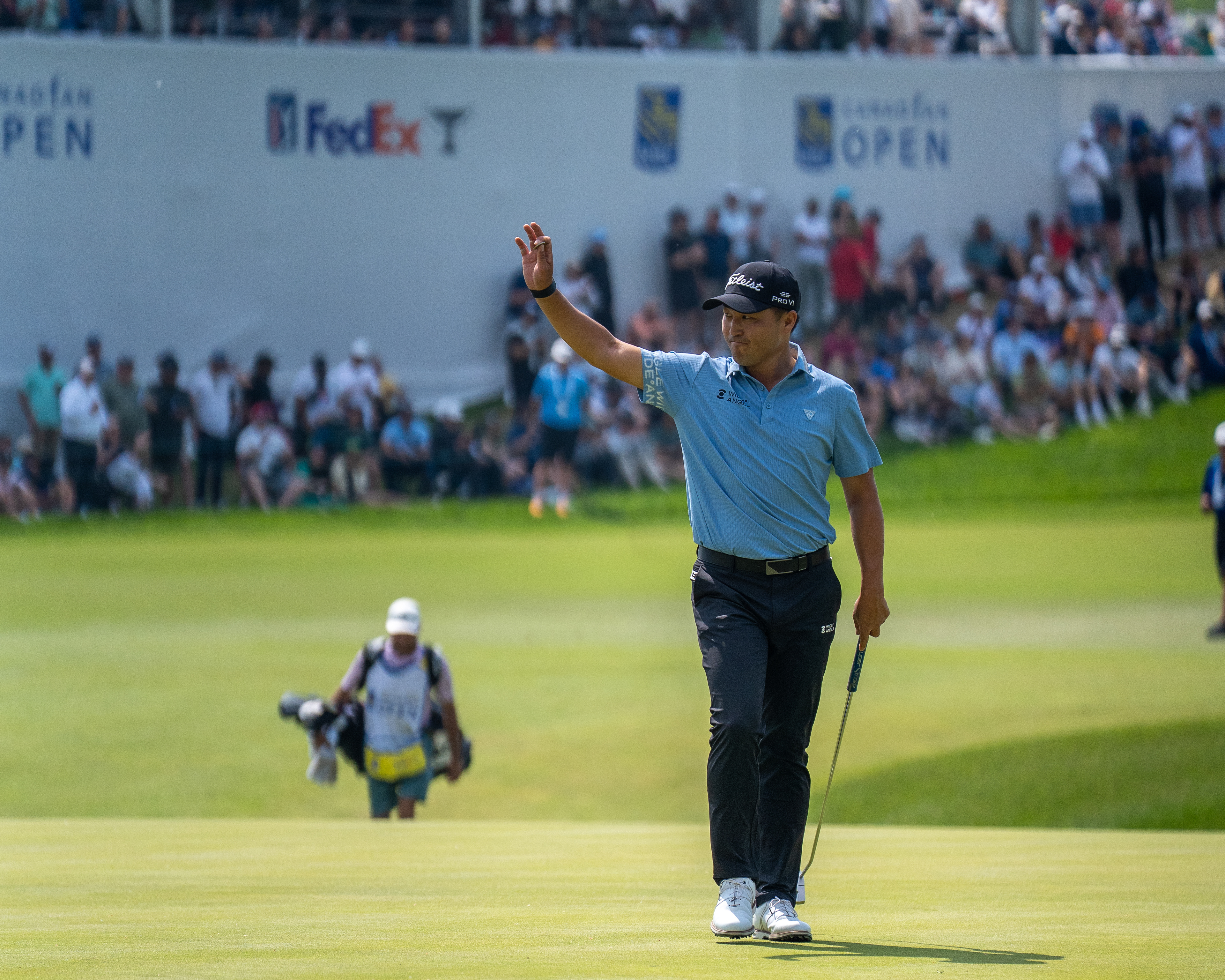 Richard T. Lee of Canada acknowledges the crowd after holing out on the 18th green during the final round of the RBC Canadian Open at TPC Toronto at Osprey Valley on June 8, 2025 in Caledon, Ontario, Canada. (Photo by Jay Barlett)