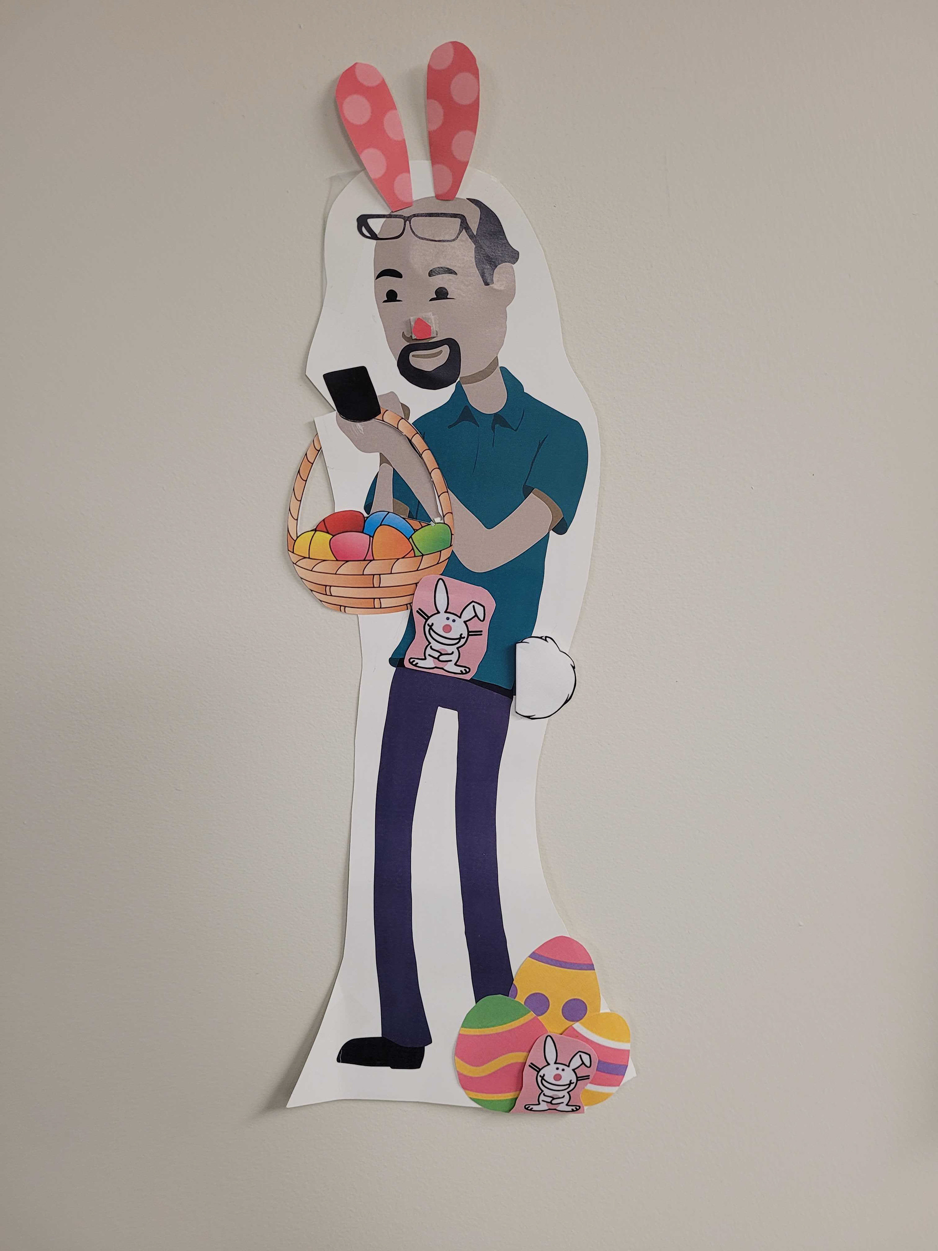My co-workers decorate my employers illustration for the holidays.