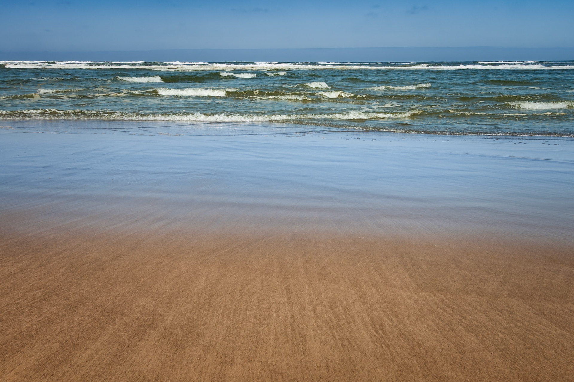 Interesting patterns in the sands along the seashore, Cape Disappointment, Washington.