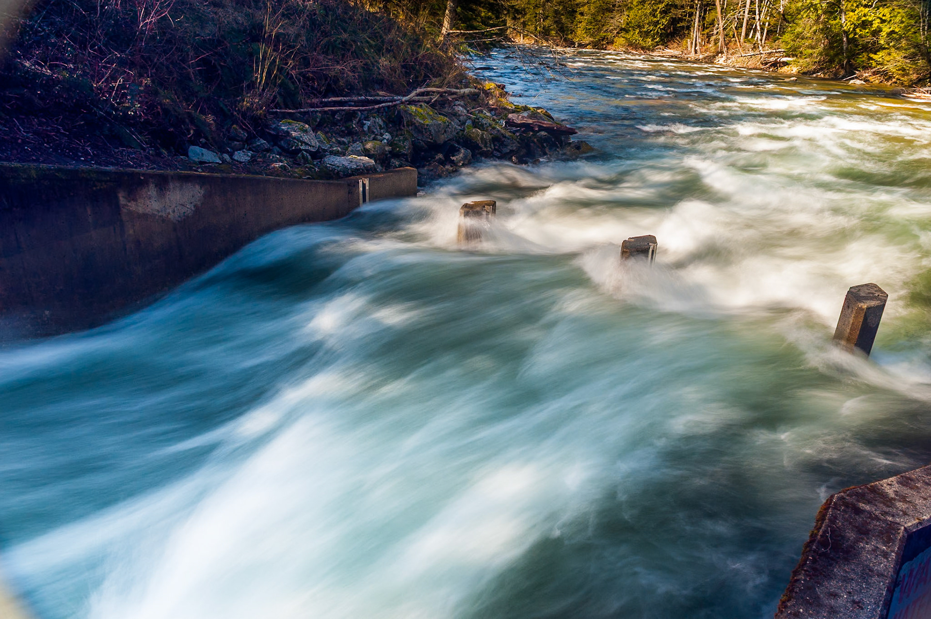 Waterflow outlet from the hydro-electric station on the South Fork Snoqualmie River, at the East end of Olallie State Partk in Washington State.