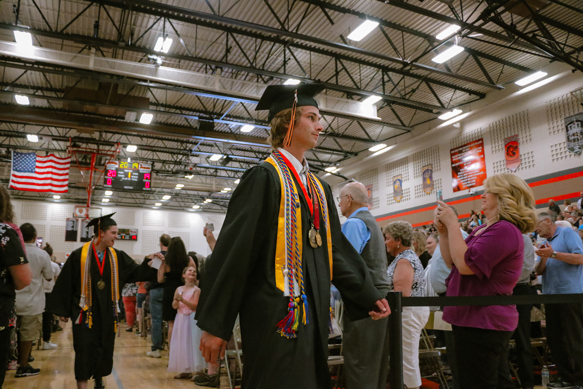 Malik Tiedt, one of two valedictorians, leads the procession of students at Burlington High School's graduation ceremony, June 7, 2019.