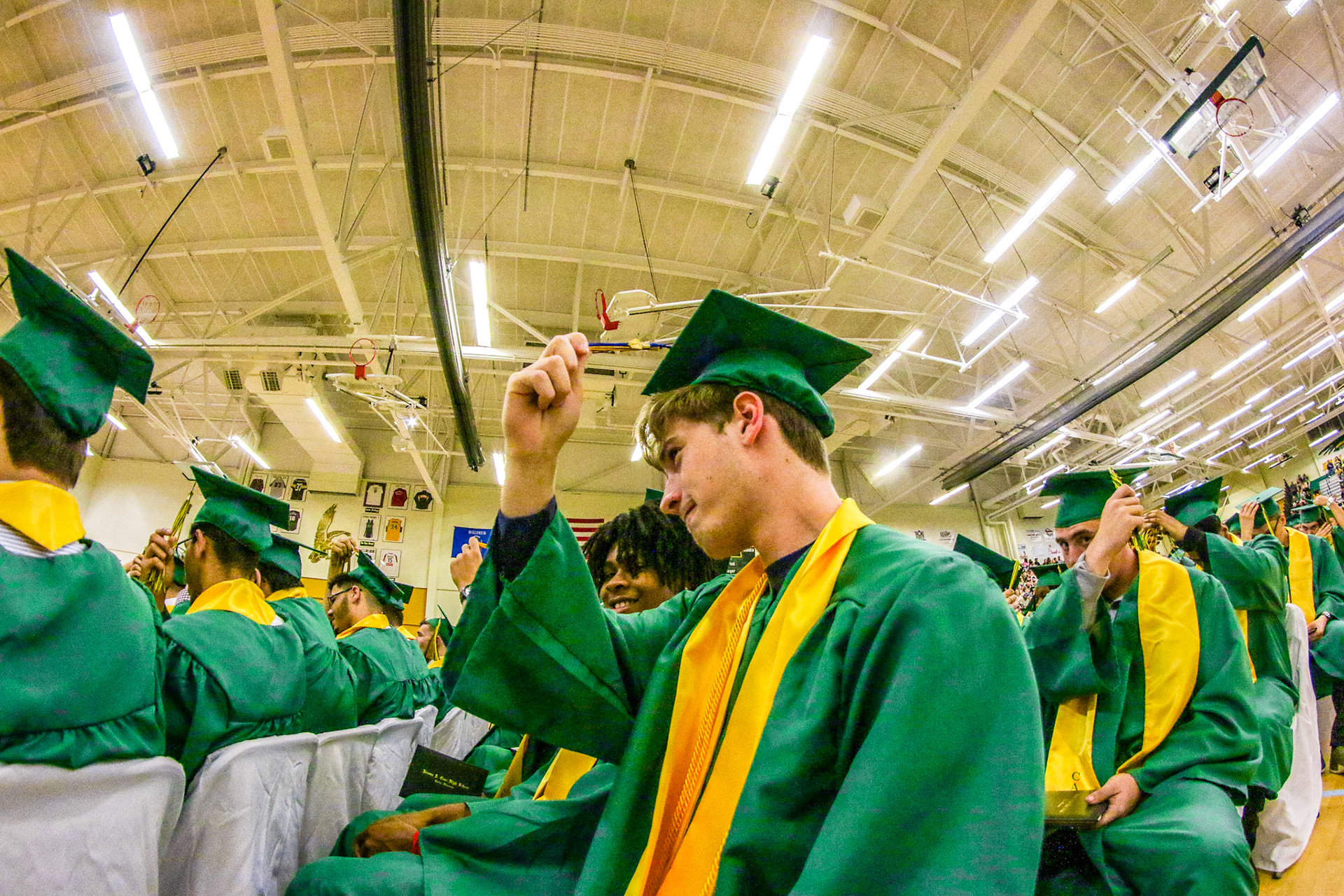 Newly graduates of Case High School turn their tassells during the Commencement Ceremony, June 8, 2019.