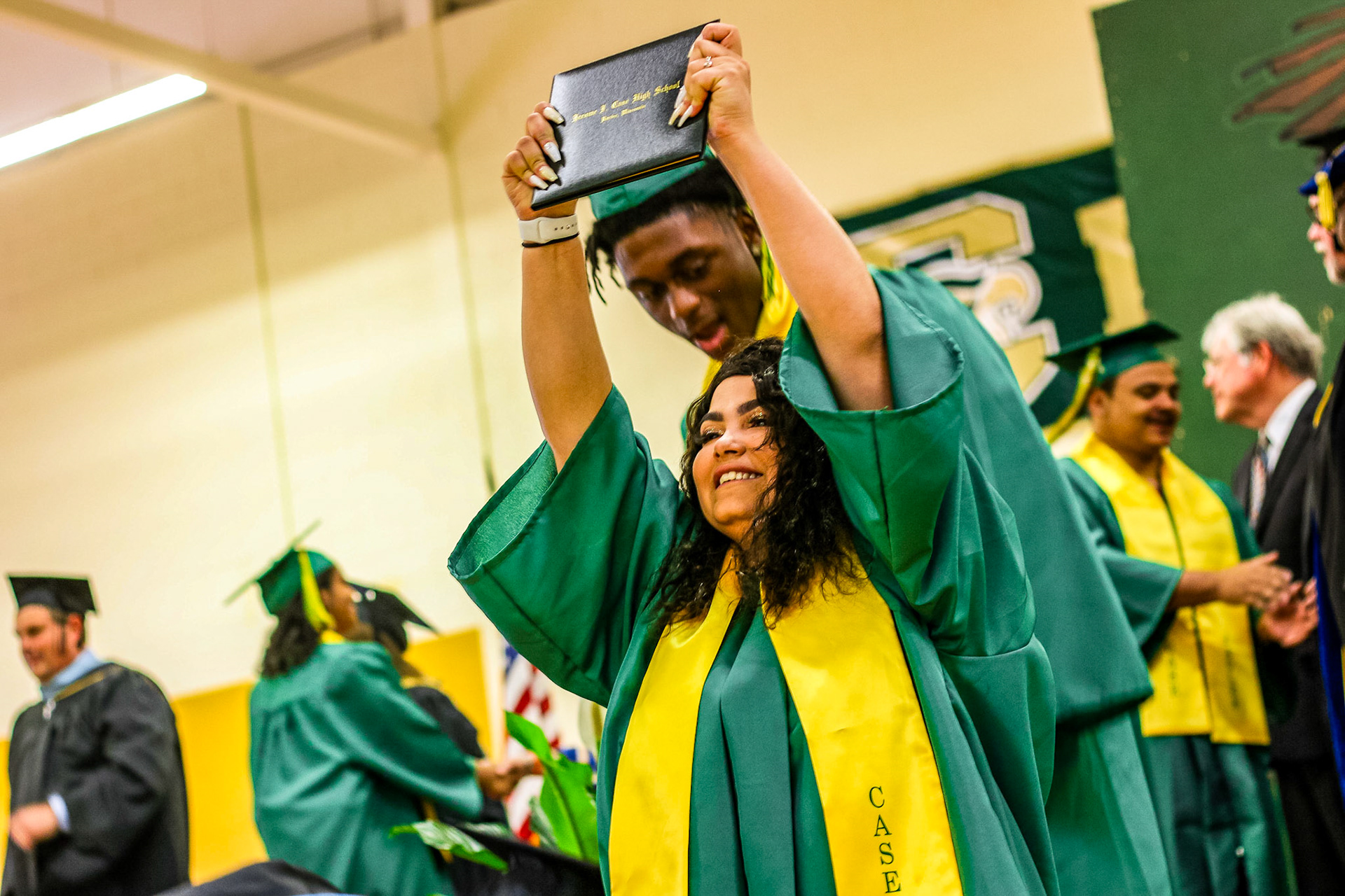 Graduates recieve their diplomas at Case High School's Commencement Ceremony, June 8, 2019.