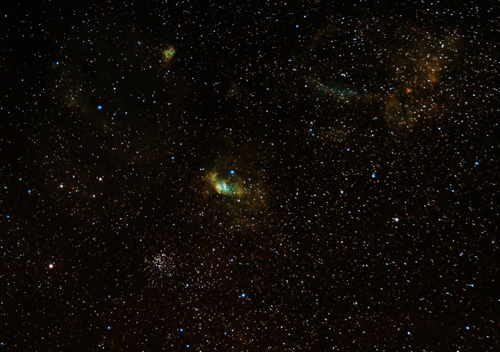 The Bubble Nebula at the right with open star cluster M52. The Bubble Nebula, also known as NGC 7635, is a mere 10 light-years wide. On the other hand, M52 is a rich open cluster of around a thousand stars. The cluster is about 25 light-years across.