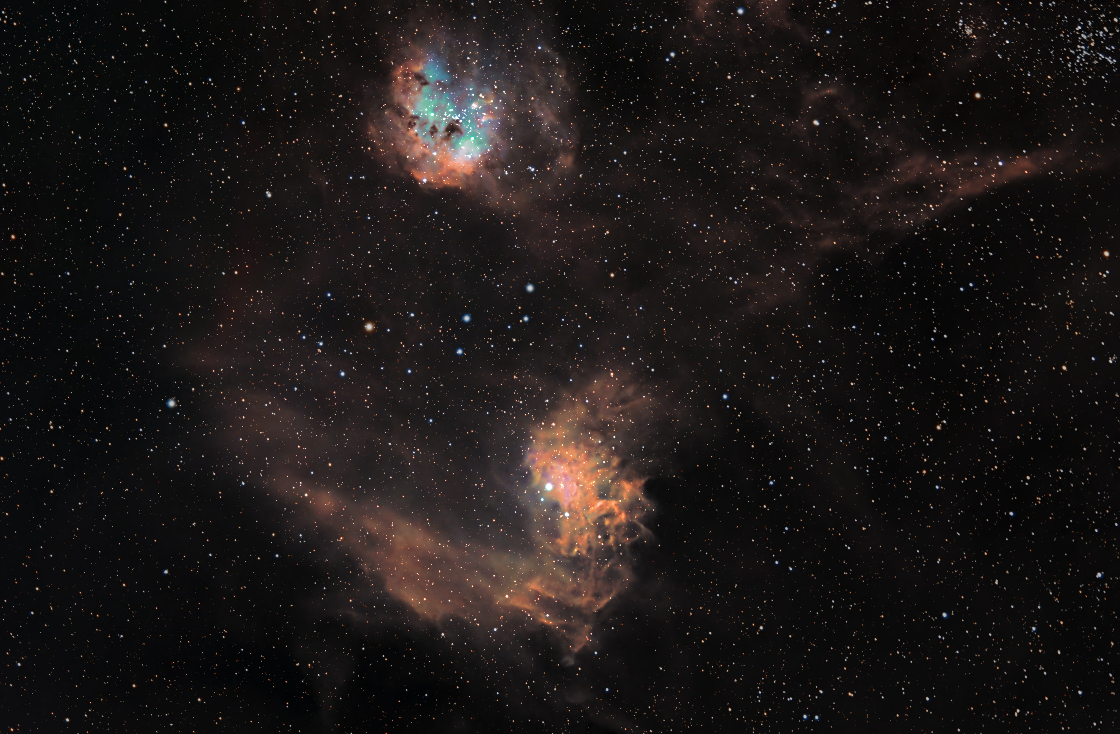 The Flaming Star Nebulae (lower), IC 405 in Auriga, lies about 1,500 light-years from Earth and is about 5 light-years across. Its companion nebulae, IC 410 is also called The Tadpole Nebulae.
