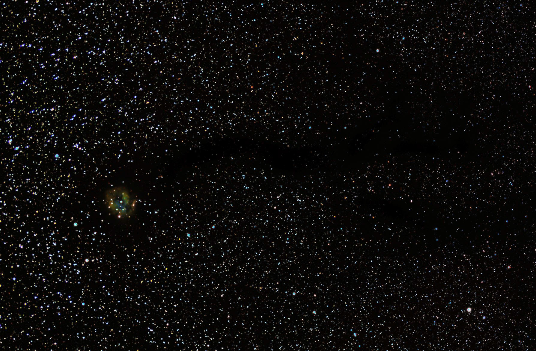 The Cocoon Nebula, IC 5146, is an emission/reflection nebula in Cygnus. Note the dark nebula as part of the complex