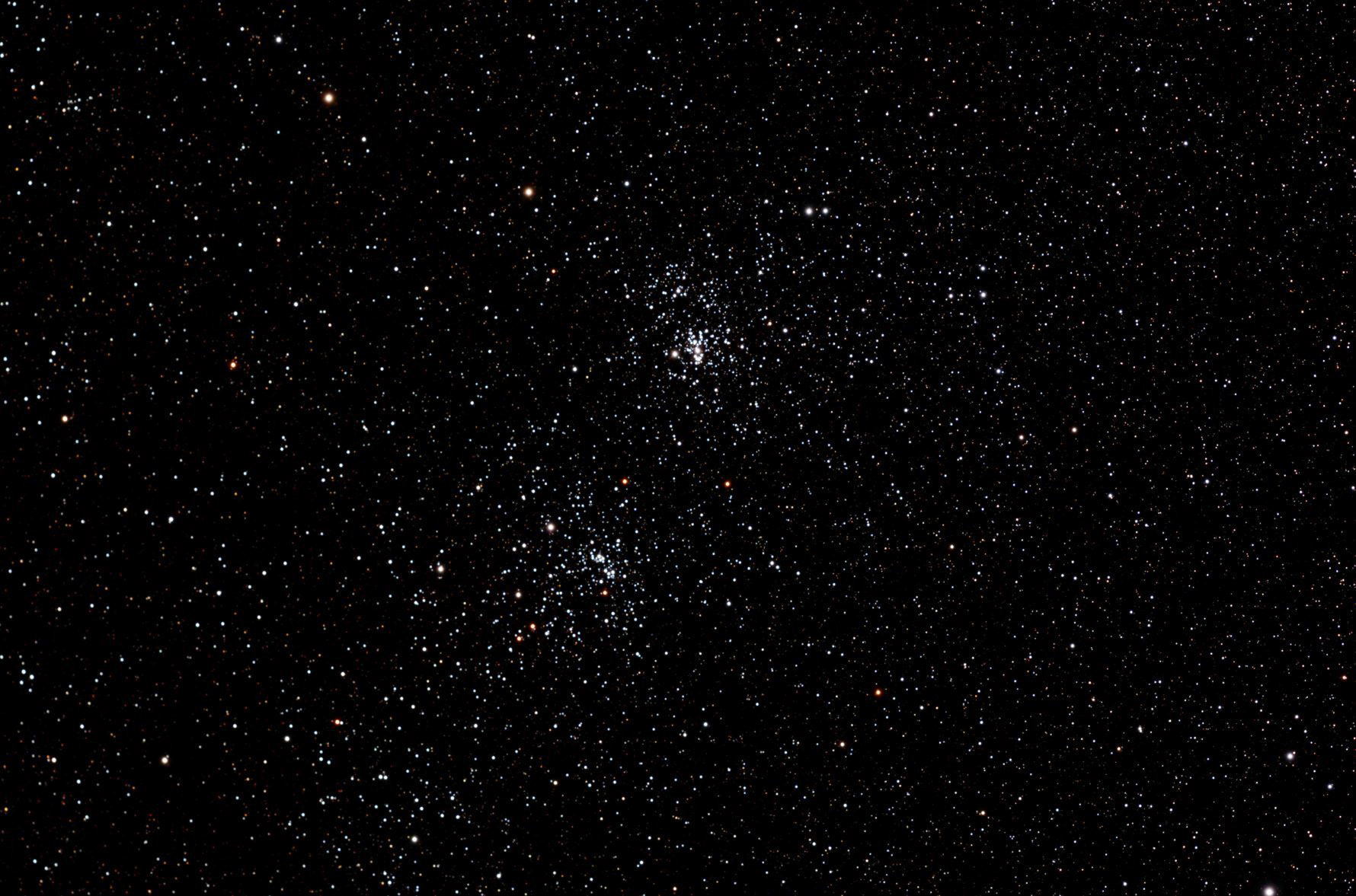 The Double Cluster of Perseus: aka as NGC 869 (top) and NGC 884, both clusters are about 7,000 light-years away and contain stars much younger and hotter than the Sun 